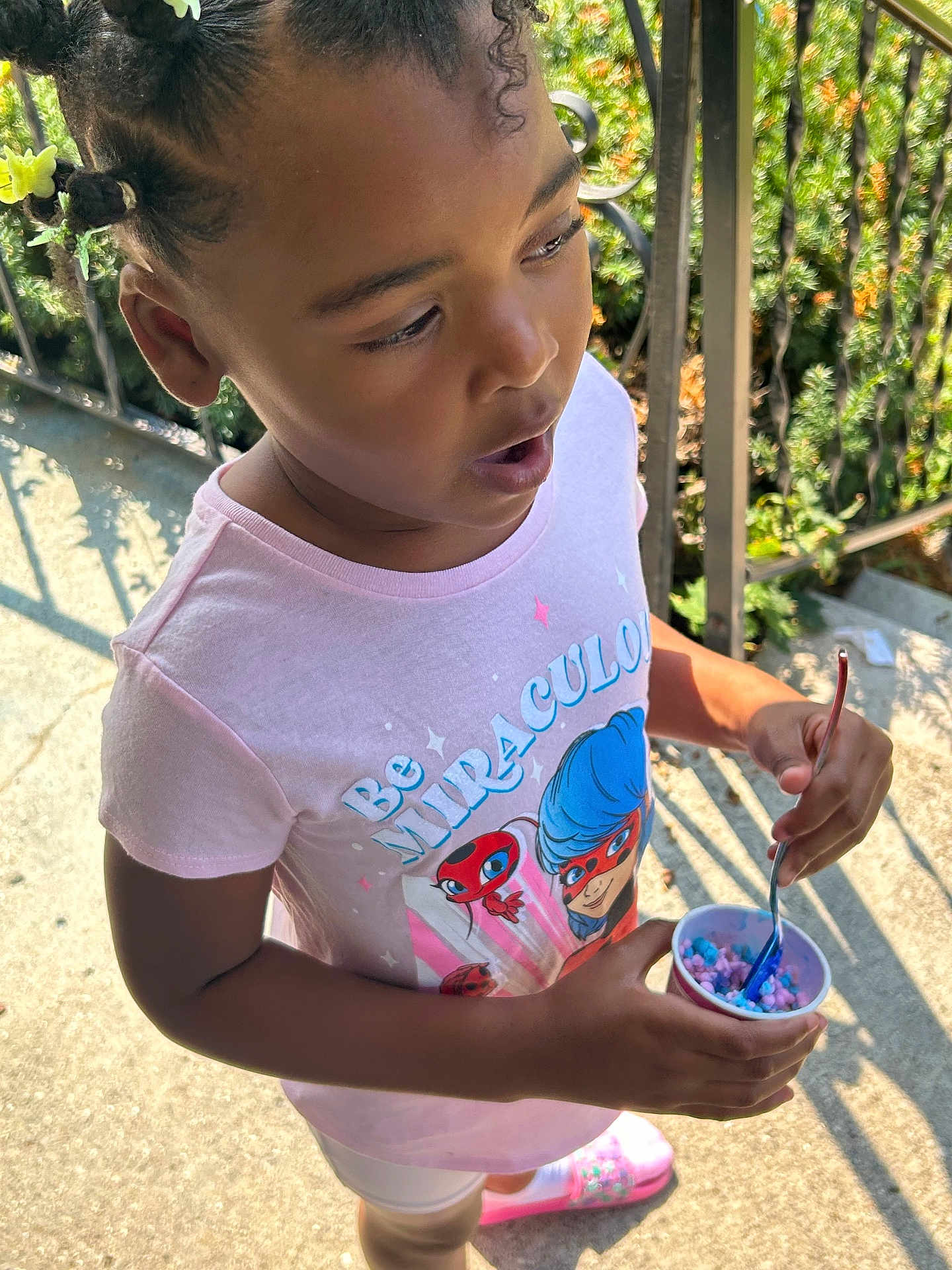 Maria is registered to the contest to win money with this photo: bowl, child, clothing, cream, cutlery, dessert, face, female, food, footwear, frozenyogurt, girl, head, icecream, person, photography, portrait, shoe, spoon, t_shirt