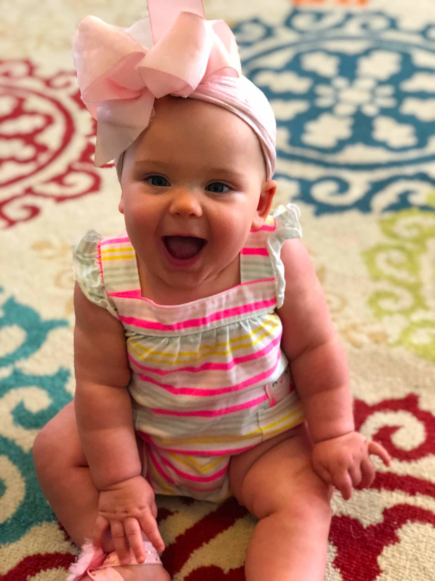 Berkley is registered to the contest to win money with this photo: cheek, child, ear, girl, hair_accessory, hand, happiness, headband, headgear, infant, joy, pattern, person, pink, product, skin, smile, textile, toddler