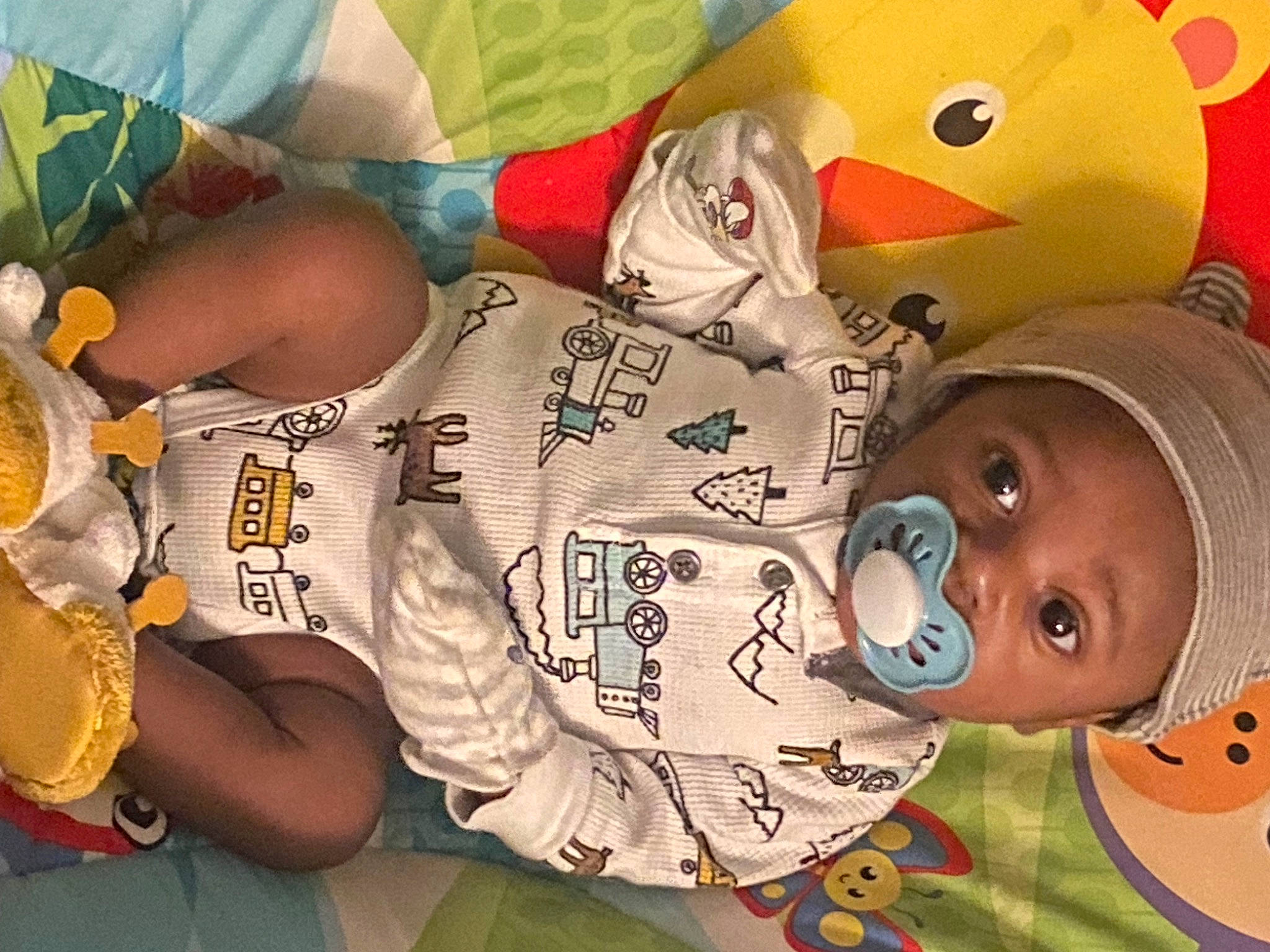 La'Rico is registered to the contest to win money with this photo: art, carmine, child, cool, elbow, font, fun, happy, hat, head, headgear, headwear, illustration, mouth, organism, pattern, person, room, textile, toy