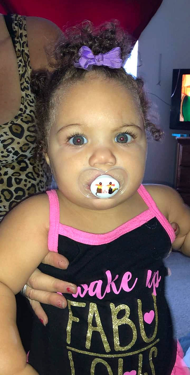 Kailynn is registered to the contest to win money with this photo: cheek, child, face, forehead, head, lip, mouth, neck, nose, person, pink, smile, toddler, tooth