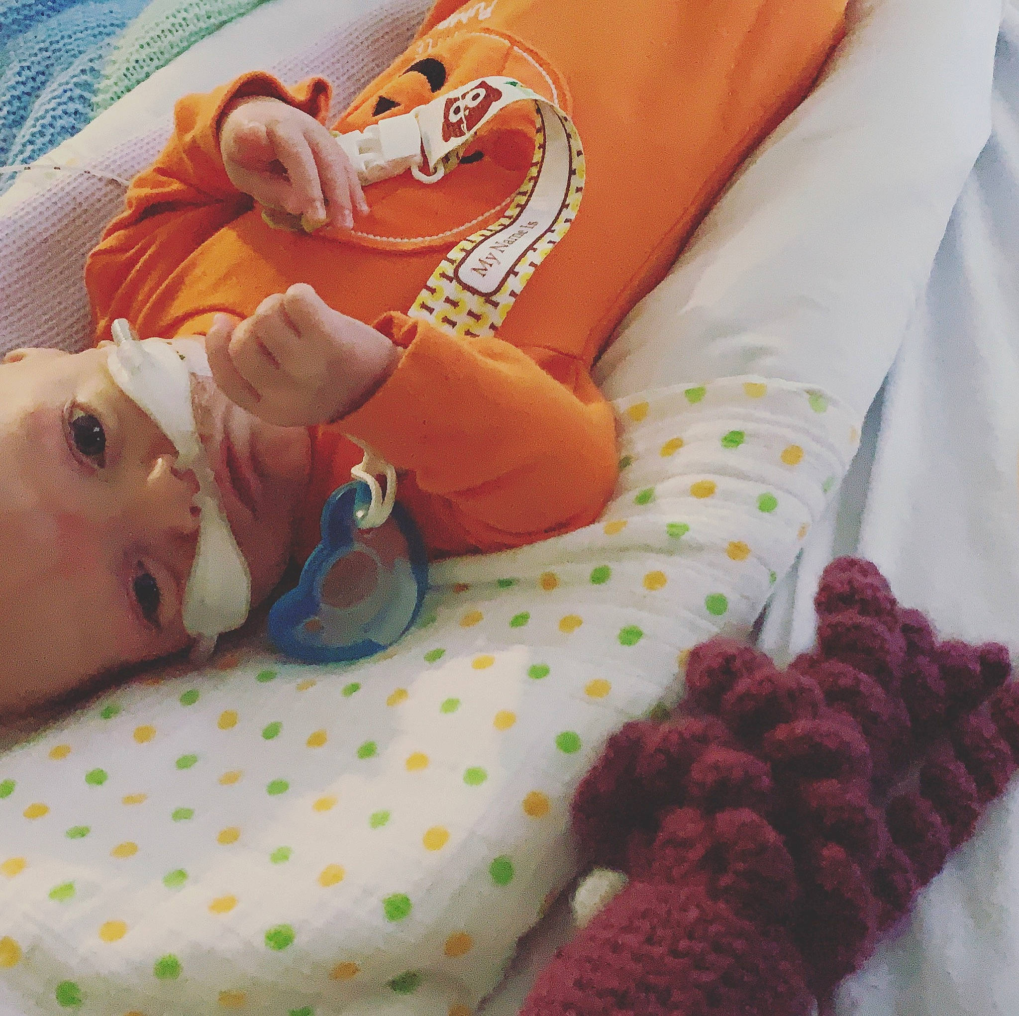 Benny is registered to the contest to win money with this photo: baby, bedtime, birth, child, finger, flesh, hand, nap, person, textile, wool