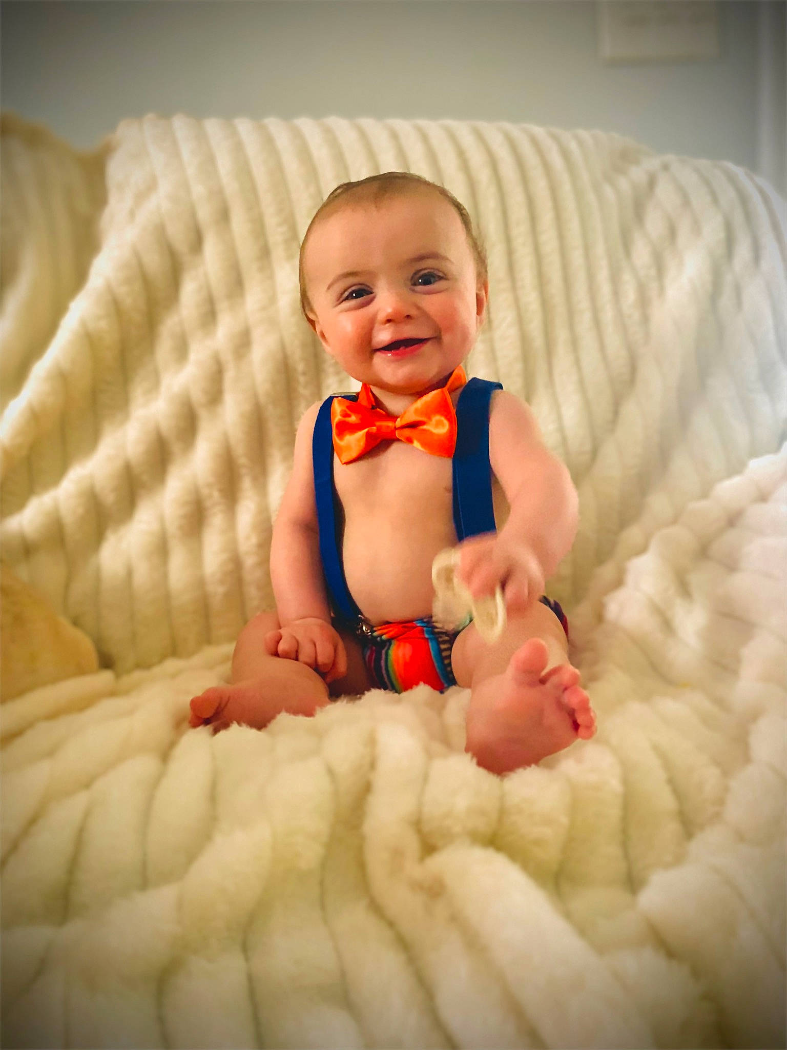 Calum is registered to the contest to win money with this photo: abdomen, baby, baby_toddler_clothing, comfort, eye, face, finger, gesture, happy, head, human_body, joy, leg, nail, nose, person, product, skin, smile, textile