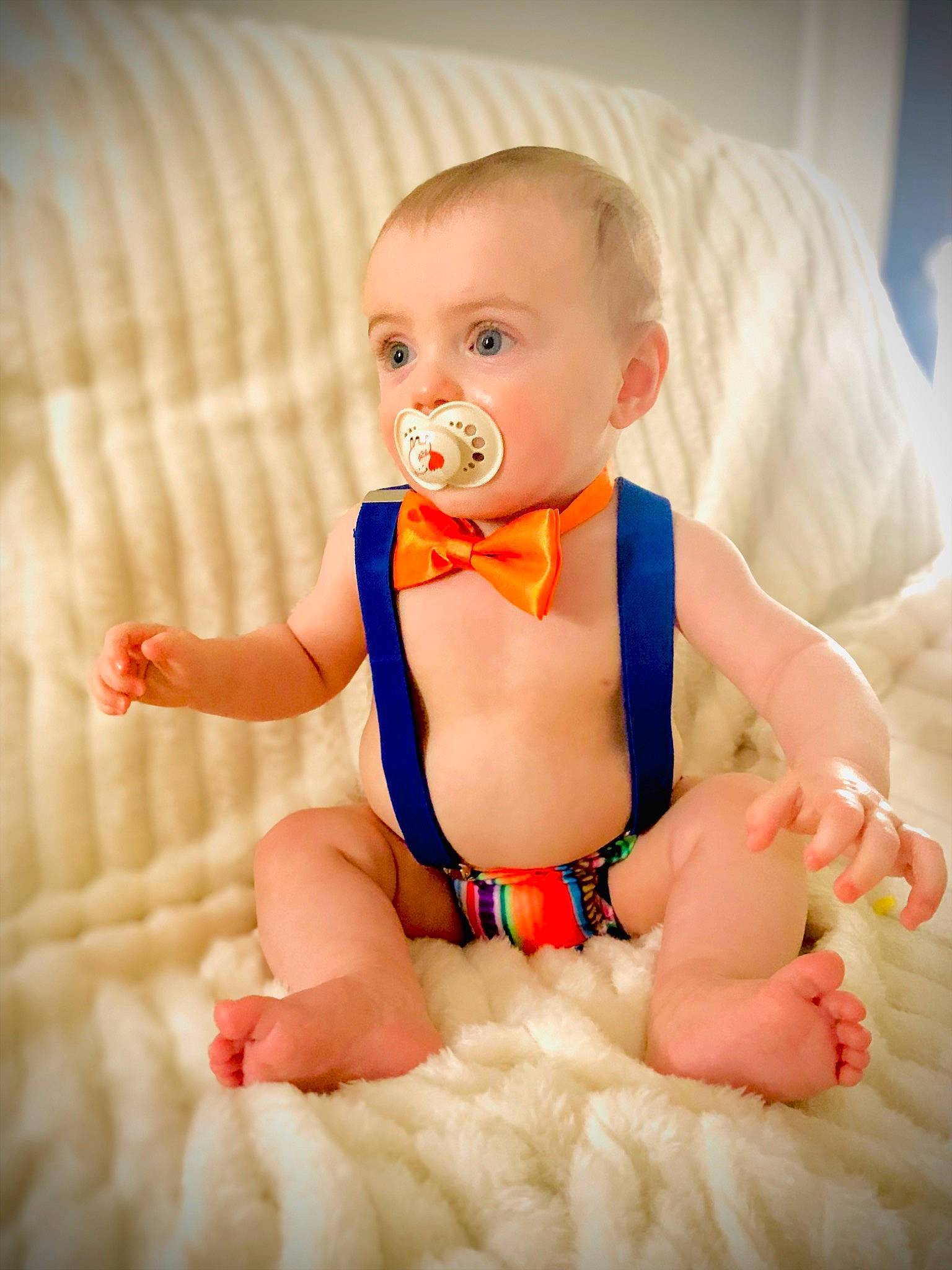 Calum joined the competition — help win amazing prizes! abdomen, arm, baby, baby_toddler_clothing, cheek, eye, finger, happy, human_body, infant_bodysuit, iris, leg, mouth, orange, person, pink, skin, stomach, surprise, thumb
