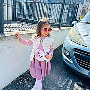 Jannah a rejoint le concours — aidez-le/la à gagner de superbes lots ! accessories, car, cat_face, child, concrete, dress, fashion, fence, girl, hair, outdoor, playful, purse, road, shoes, sidewalk, smile, sunglasses, sunny, vest