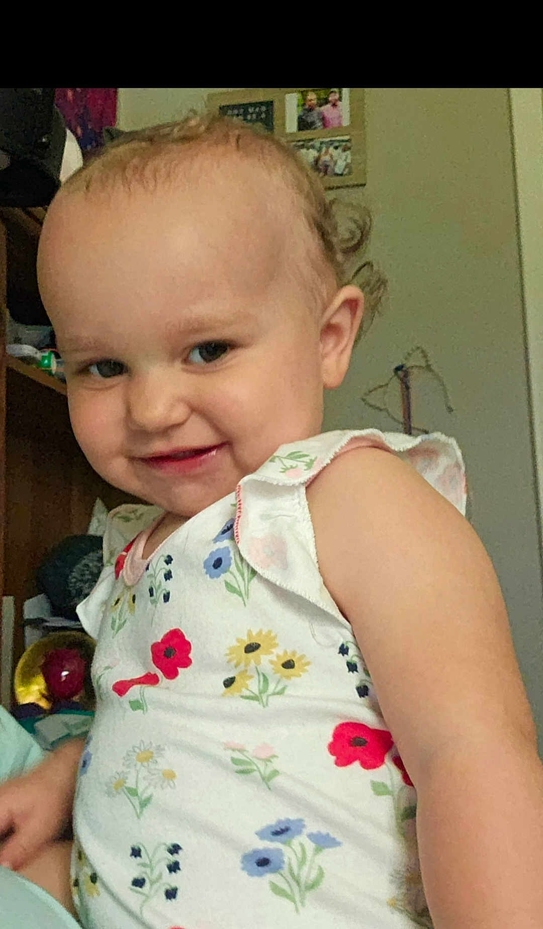 Zo'E joined the competition — help win amazing prizes! toddler, child, smiling, indoor, floral_dress, face, person, hair, skin, cheek, shoulder, furniture, shelf, photography, cute, portrait, happy, head, baby, clothing