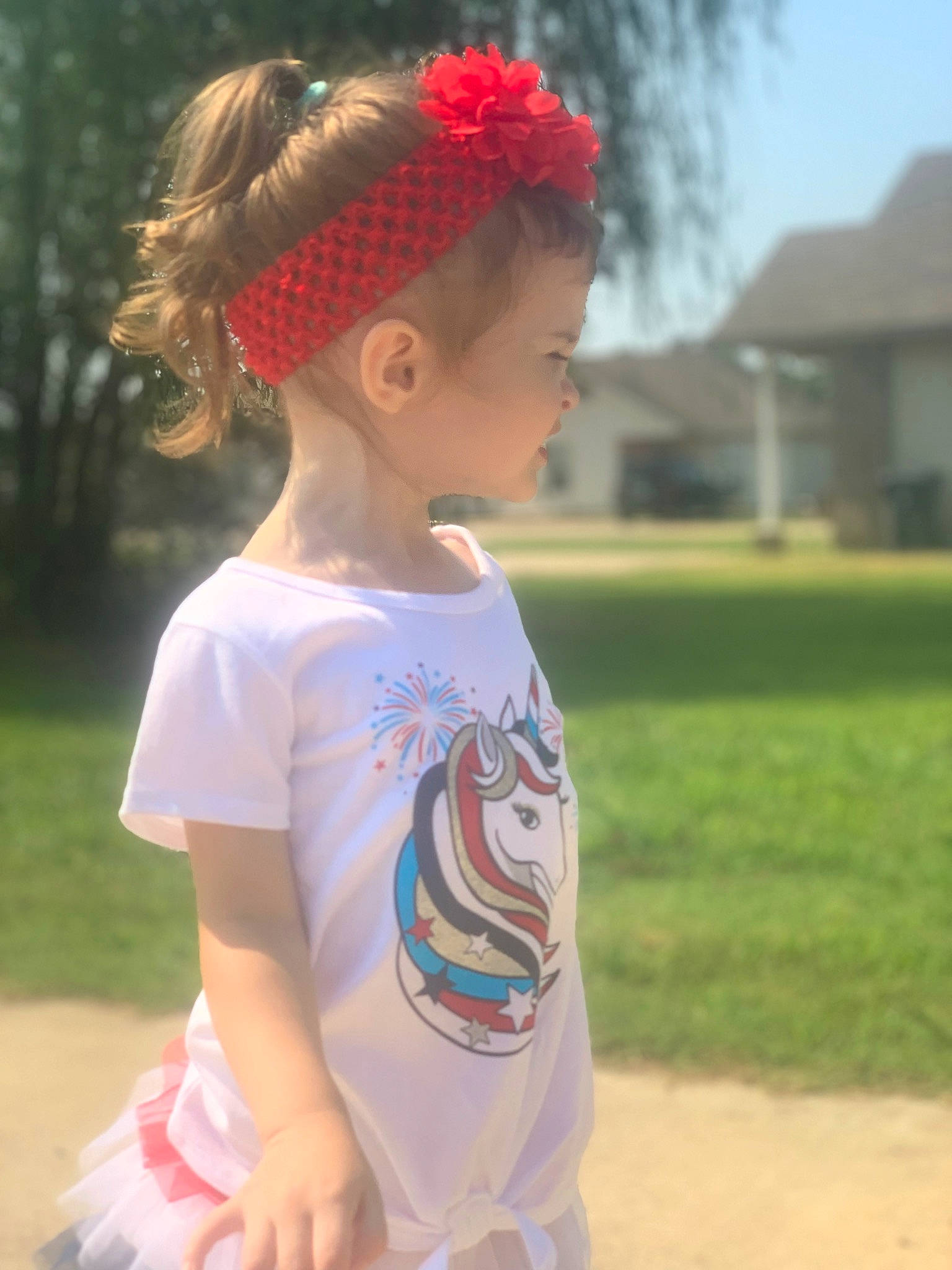 Ainsley is registered to the contest to win money with this photo: child, cool, electric_blue, fun, grass, grass_family, grassland, hair, hairstyle, happy, headband, headpiece, leisure, neck, person, recreation, shoulder, sleeve, street_fashion, t_shirt