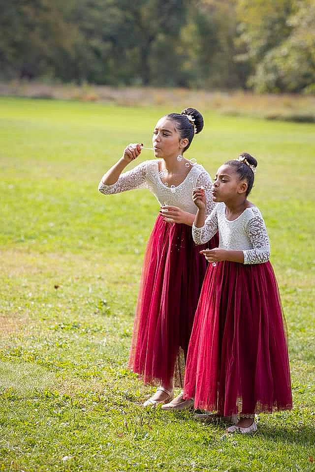 Caleah is registered to the contest to win money with this photo: child, entertainment, event, formal_wear, fun, gesture, grass, grass_family, grassland, happy, landscape, lawn, leisure, meadow, people_in_nature, performing_arts, person, plant, recreation, tree