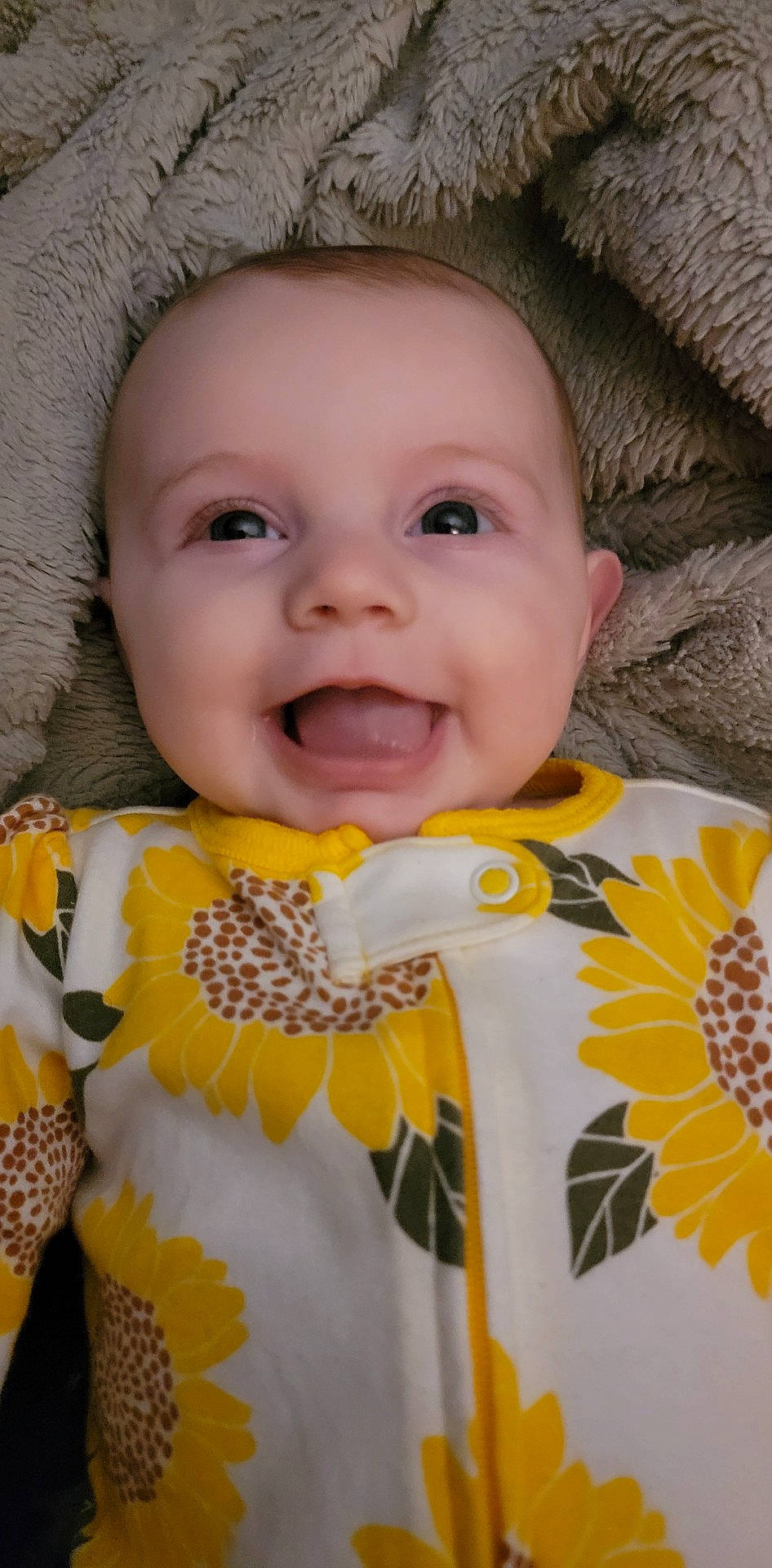 Evelynn joined the competition — help win amazing prizes! baby, baby_toddler_clothing, cheek, eye, eyebrow, face, facial_expression, happy, iris, lip, nose, orange, organ, outerwear, person, product, skin, sleeve, smile, textile