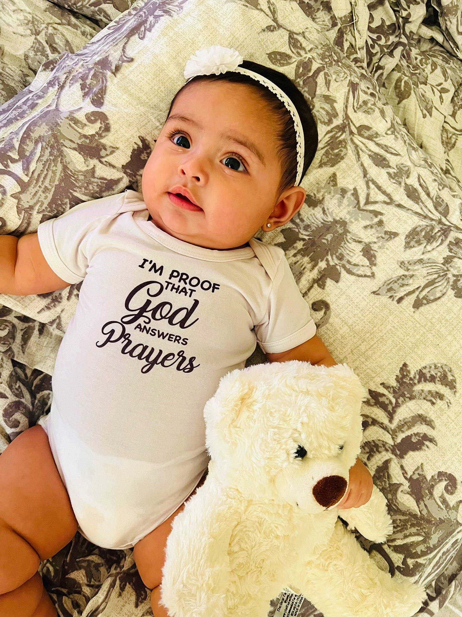 Lexie joined the competition — help win amazing prizes! baby, baby_toddler_clothing, eye, face, facial_expression, flash_photography, fun, happy, head, organ, person, photograph, pink, skin, sleeve, smile, teddy_bear, textile, toddler, toy