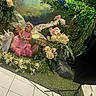 Alani is registered to the contest to win money with this photo: toddler, child, fairy_wings, pink_dress, flower_crown, unicorn_statue, flowers, greenery, mushroom_prop, studio_lighting, portrait, indoor, grass_rug, joyful, smiling, holding_object, decor, fantasy_theme, photography, cute