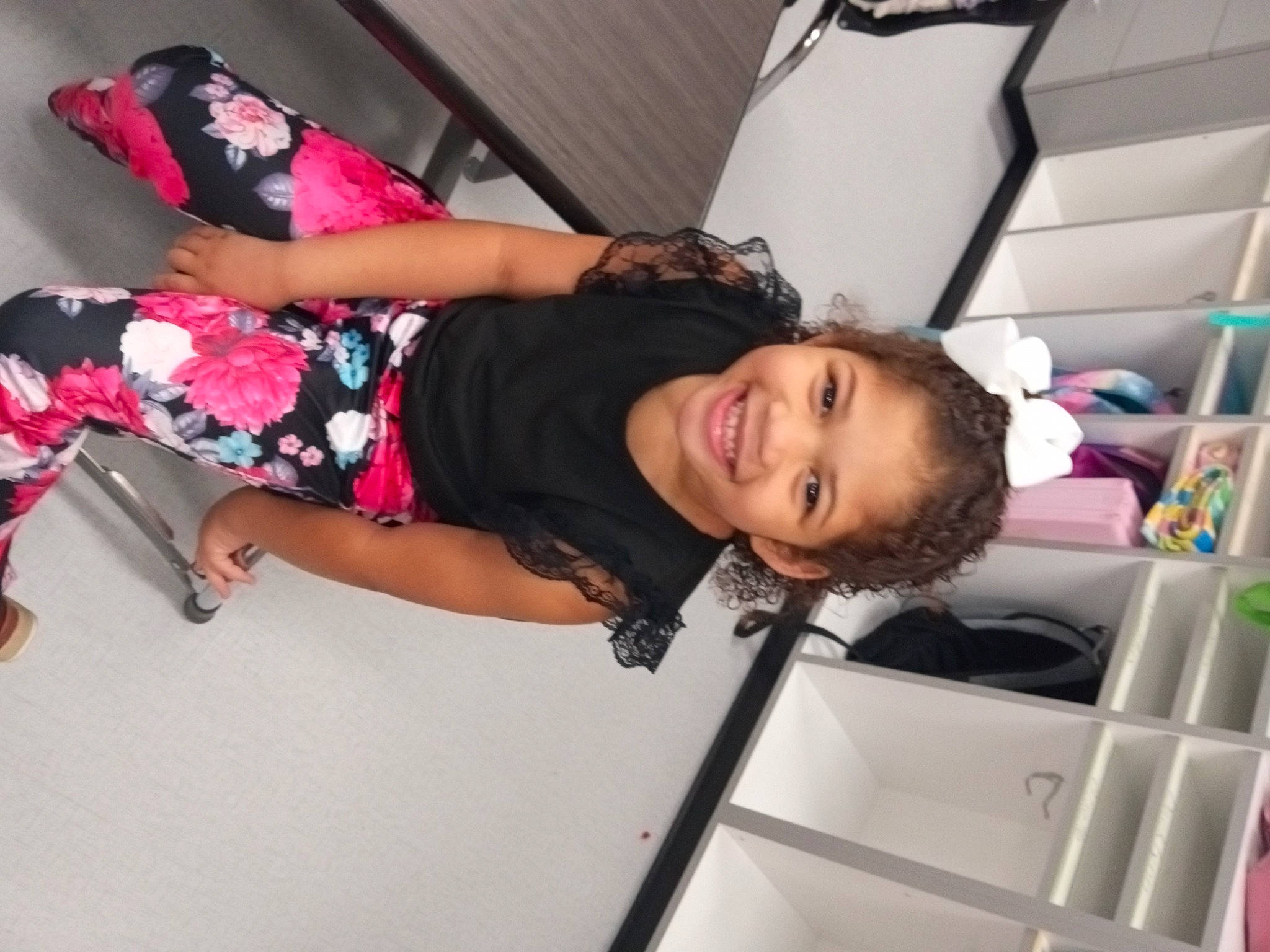 Scottlynn is registered to the contest to win money with this photo: black_hair, child, day_dress, elbow, fashion_accessory, fashion_design, fun, happy, human_leg, joy, knee, leisure, magenta, person, pink, skin, sleeve, smile, thigh, toddler