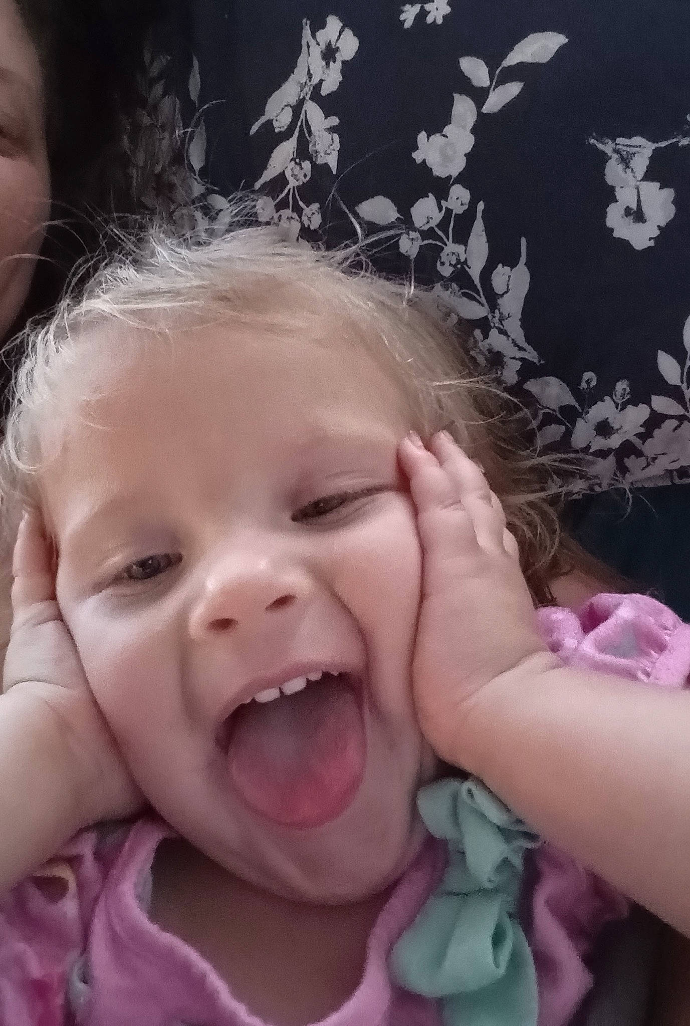 Eretria is registered to the contest to win money with this photo: baby, cheek, chin, ear, eyebrow, facial_expression, finger, fun, gesture, happy, human_body, iris, lip, mouth, nose, person, pink, skin, smile, toddler