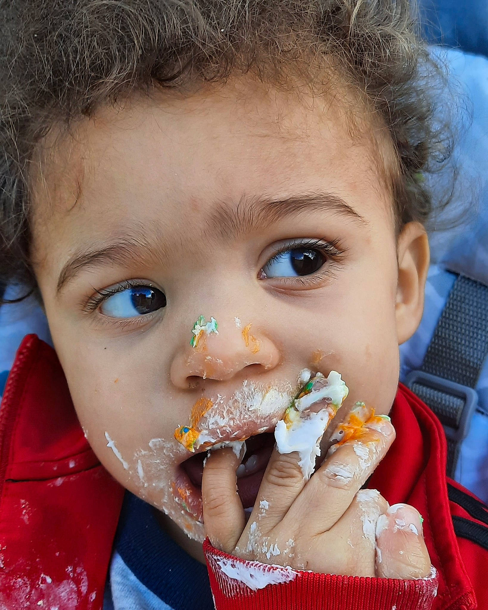 Lazarus is registered to the contest to win money with this photo: baby_playing_with_food, biting, cheek, child, chin, close_up, ear, eyelash, finger, food_craving, fun, gesture, happy, iris, lip, mouth, nose, organ, person, skin