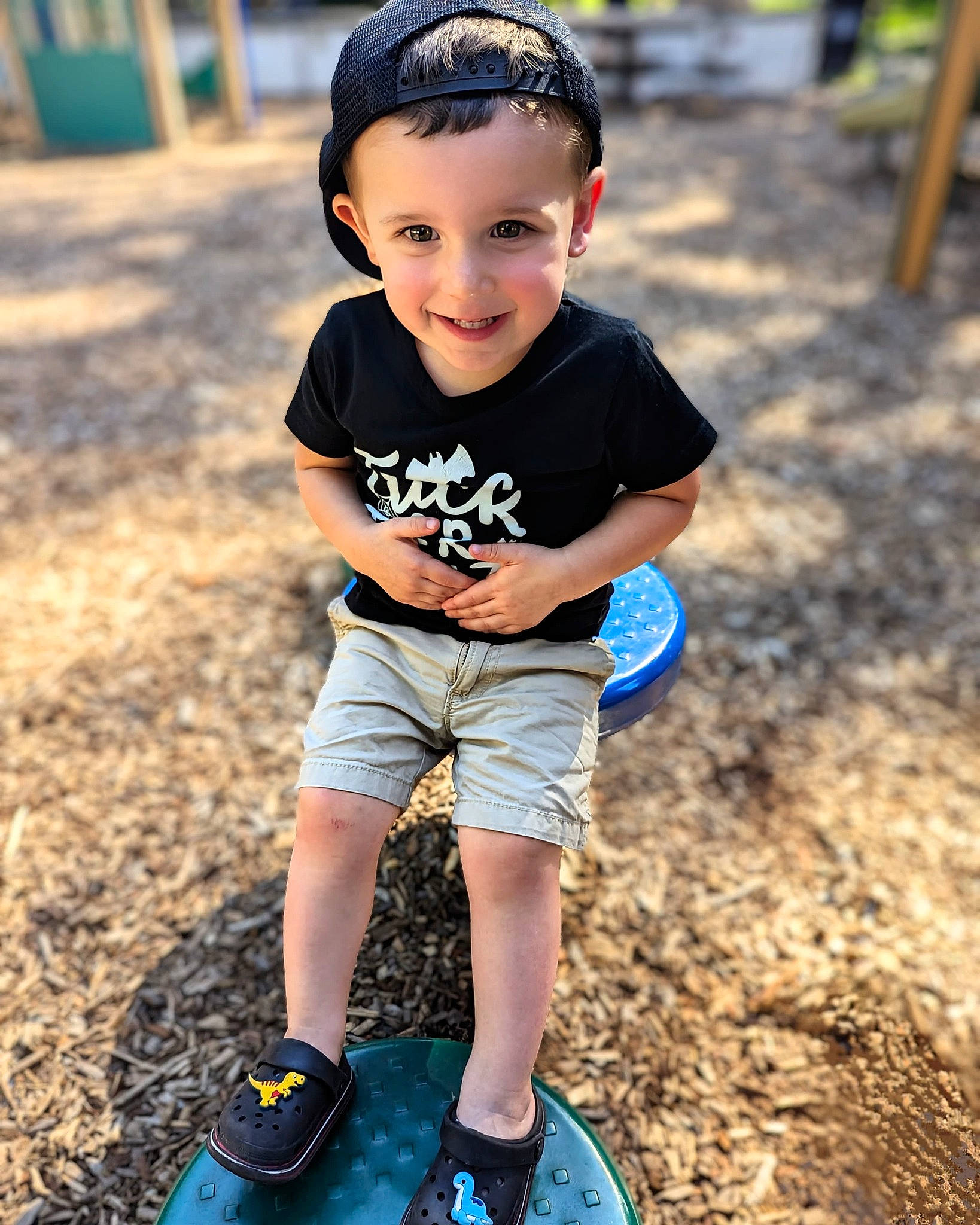 Bryson joined the competition — help win amazing prizes! arm, blue, cool, flash_photography, grass, green, hairstyle, happy, head, headwear, joy, leg, people_in_nature, person, photograph, shorts, smile, summer, sunlight, t_shirt