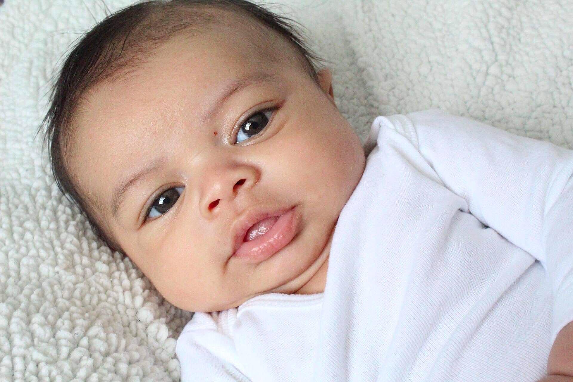 Jermaine is registered to the contest to win money with this photo: baby, cheek, child, chin, close_up, ear, eye, face, facial_expression, forehead, head, lip, mouth, nose, person, portrait_photography, skin, smile, toddler