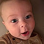 Oliver is registered to the contest to win money with this photo: baby, close_up, face, child, infant, eyes, mouth, expression, skin, eyelashes, clothing, brown, cute, portrait, head, looking, indoors, soft_light, young, adorable