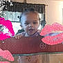 Toshia Harris is registered to the contest to win money with this photo: toddler, child, baby, playpen, indoor, curtains, window, face, happy, smiling, clothing, patterned_clothing, hand, railing, lip_prints, glitter, pink, purple, decorative_overlay, home