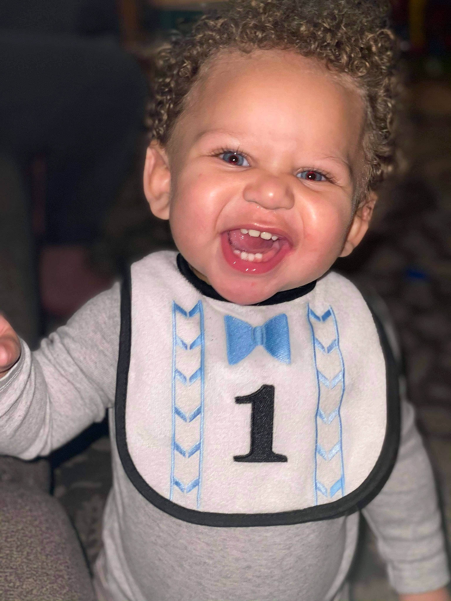 Joseph is registered to the contest to win money with this photo: baby, baby_laughing, baby_products, baby_toddler_clothing, bib, cheek, child, ear, forehead, iris, jheri_curl, laugh, long_sleeved_t_shirt, mouth, person, pleased, sleeve, thumb, toddler, tongue