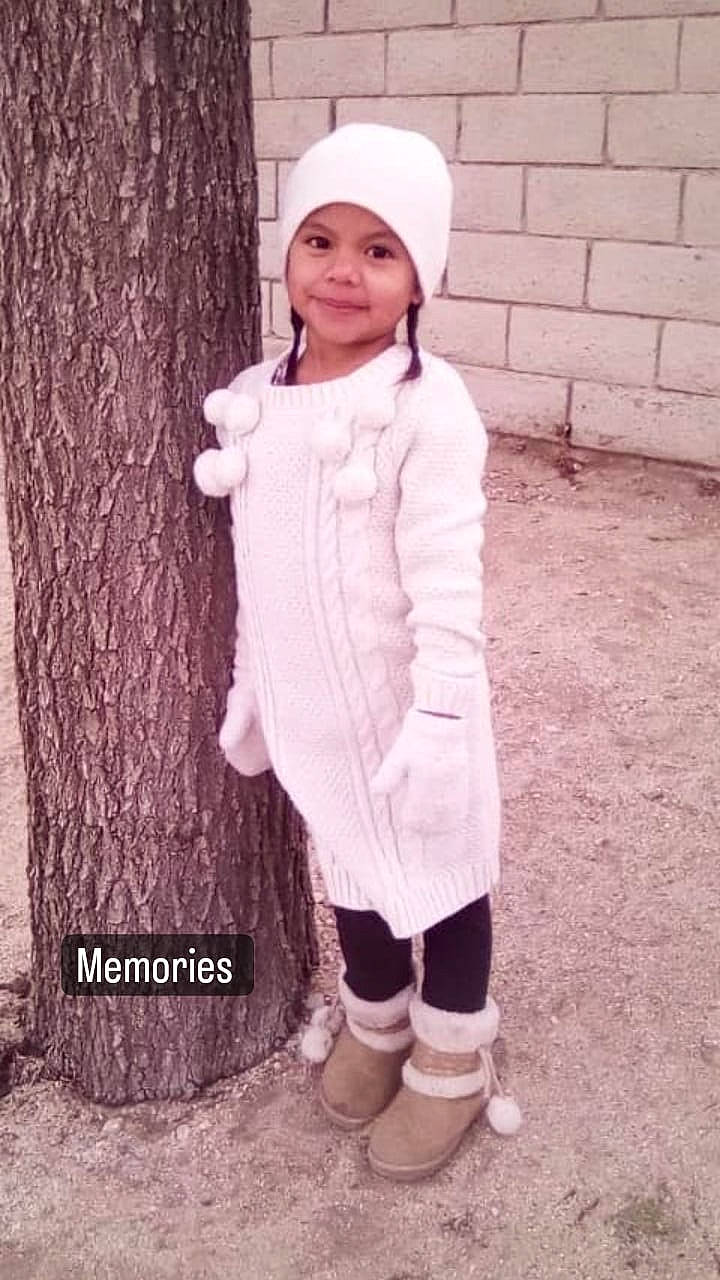 Jayde joined the competition — help win amazing prizes! child, clothing, face, fashion_design, fur, glove, happy, headwear, human_leg, jacket, joy, knee, leg, outerwear, pattern, person, pink, sleeve, smile, sock