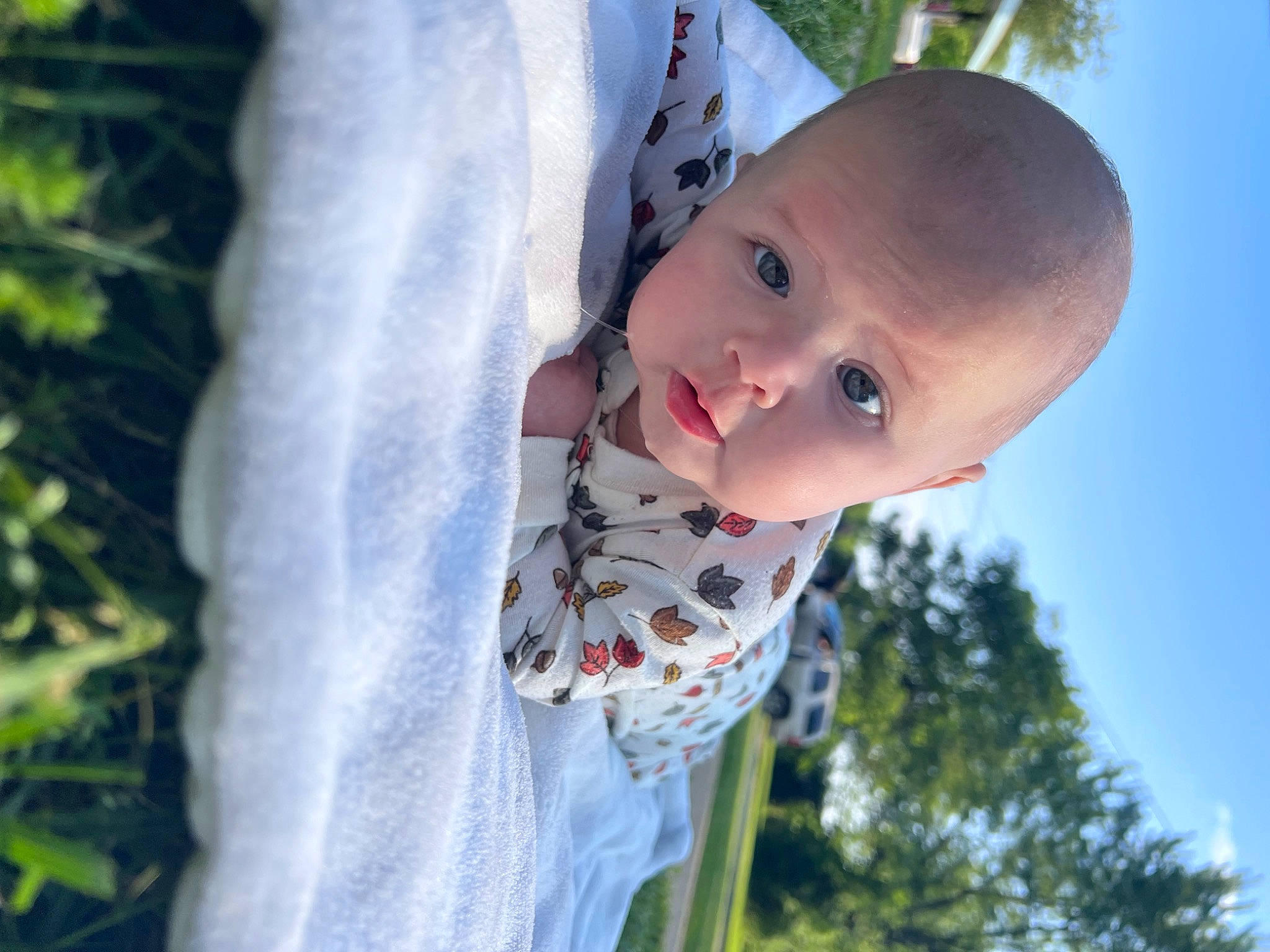 Irelynn is registered to the contest to win money with this photo: baby, baby_toddler_clothing, child, fun, grass, happy, hat, leisure, lip, morning, nose, organism, pattern, people_in_nature, person, plant, skin, sky, sunlight, toddler