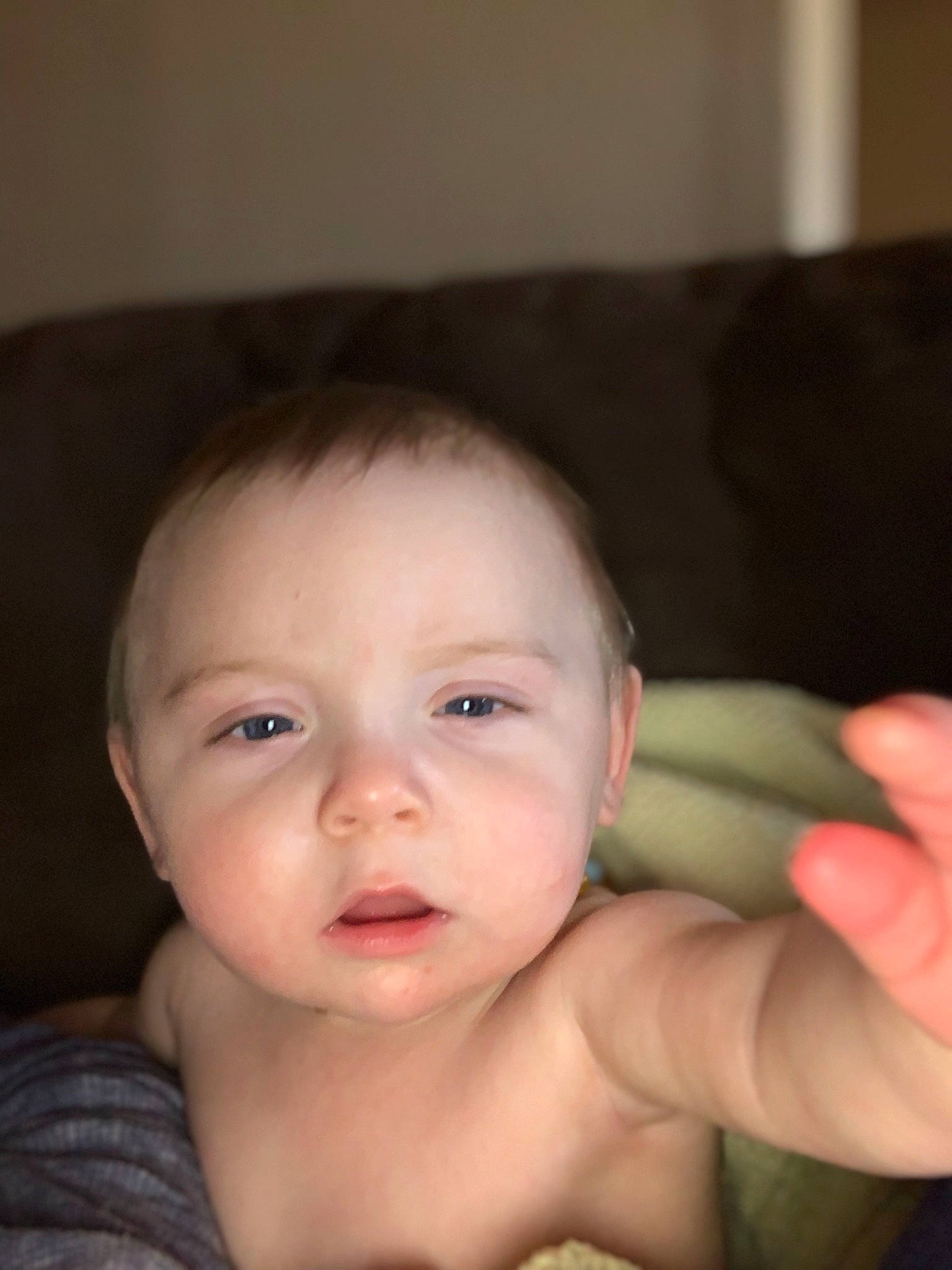 Jameson is registered to the contest to win money with this photo: boy, cheek, child, chin, close_up, ear, eye, eyebrow, face, finger, forehead, hand, head, infant, lip, mouth, nose, person, skin, smile