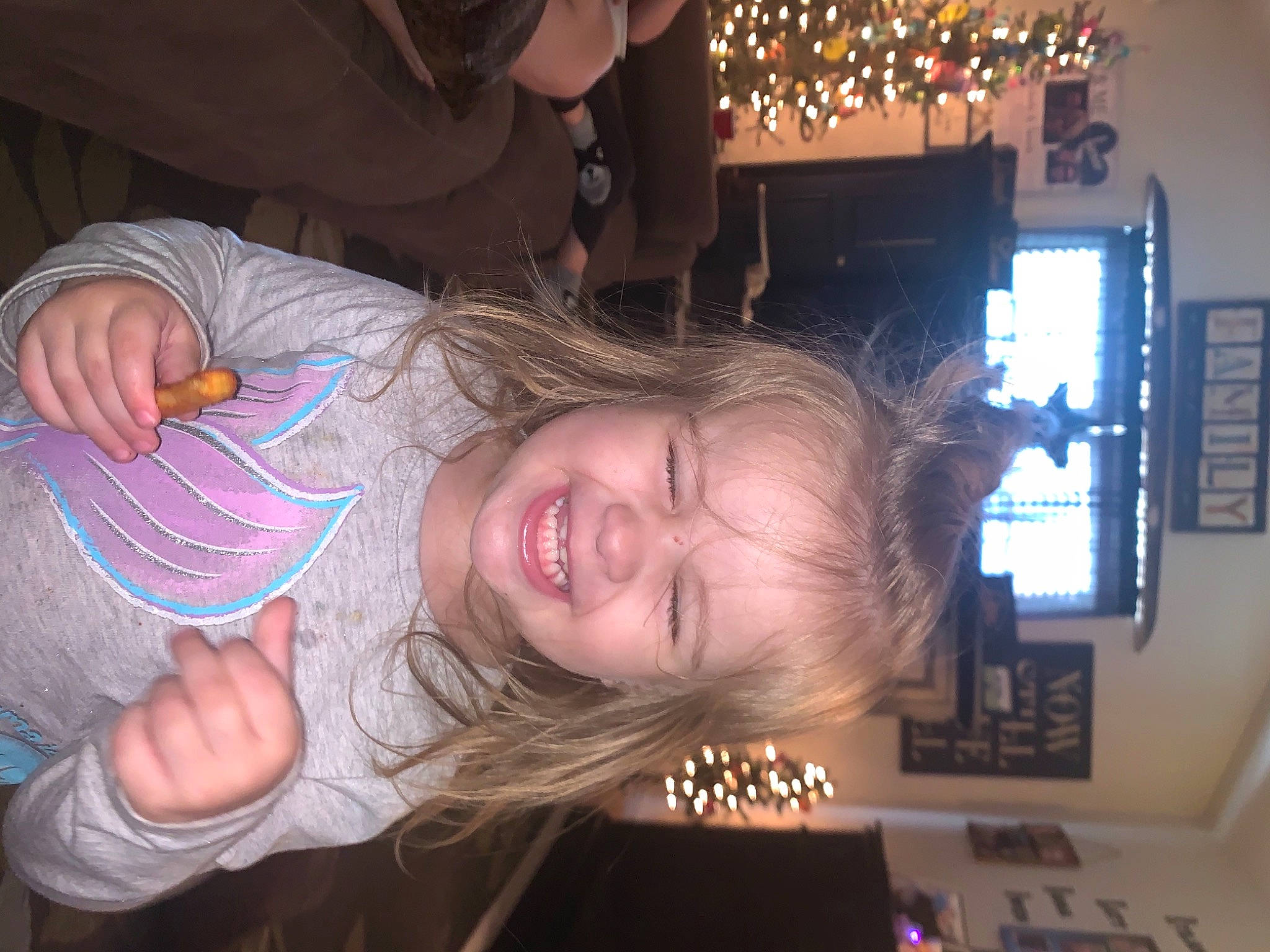 Ella joined the competition — help win amazing prizes! brown_hair, child, display_device, ear, event, finger, fun, joy, light, lighting, mouth, nail, organ, party, person, room, smile, space, television, television_set