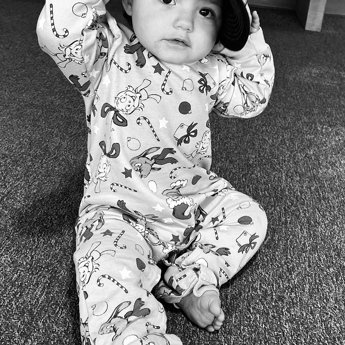 Raylynn joined the competition — help win amazing prizes! baby, baseballcap, bodypart, cap, clothing, crashhelmet, face, finger, glove, hand, hardhat, hat, head, helmet, pajamas, person, photography, portrait, sitting, sleeve