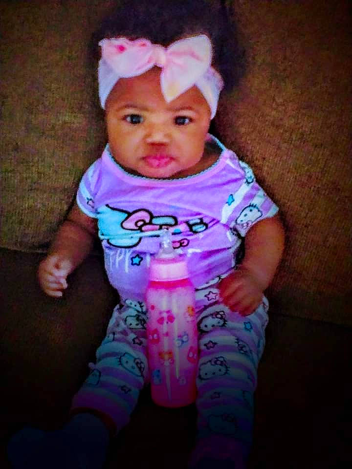 Ky'Una is registered to the contest to win money with this photo: baby, baby_toddler_clothing, cheek, child, cool, dress, electric_blue, fun, glasses, happy, headgear, headwear, magenta, pattern, person, pink, purple, skin, sleeve, t_shirt