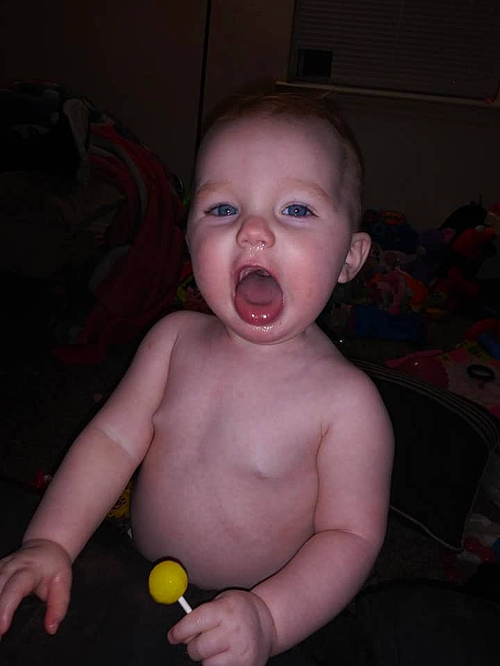 Kyah is registered to the contest to win money with this photo: arm, baby, cheek, child, chin, eye, face, facial_expression, finger, fun, head, human_body, joint, lip, mouth, nose, organ, person, skin, smile