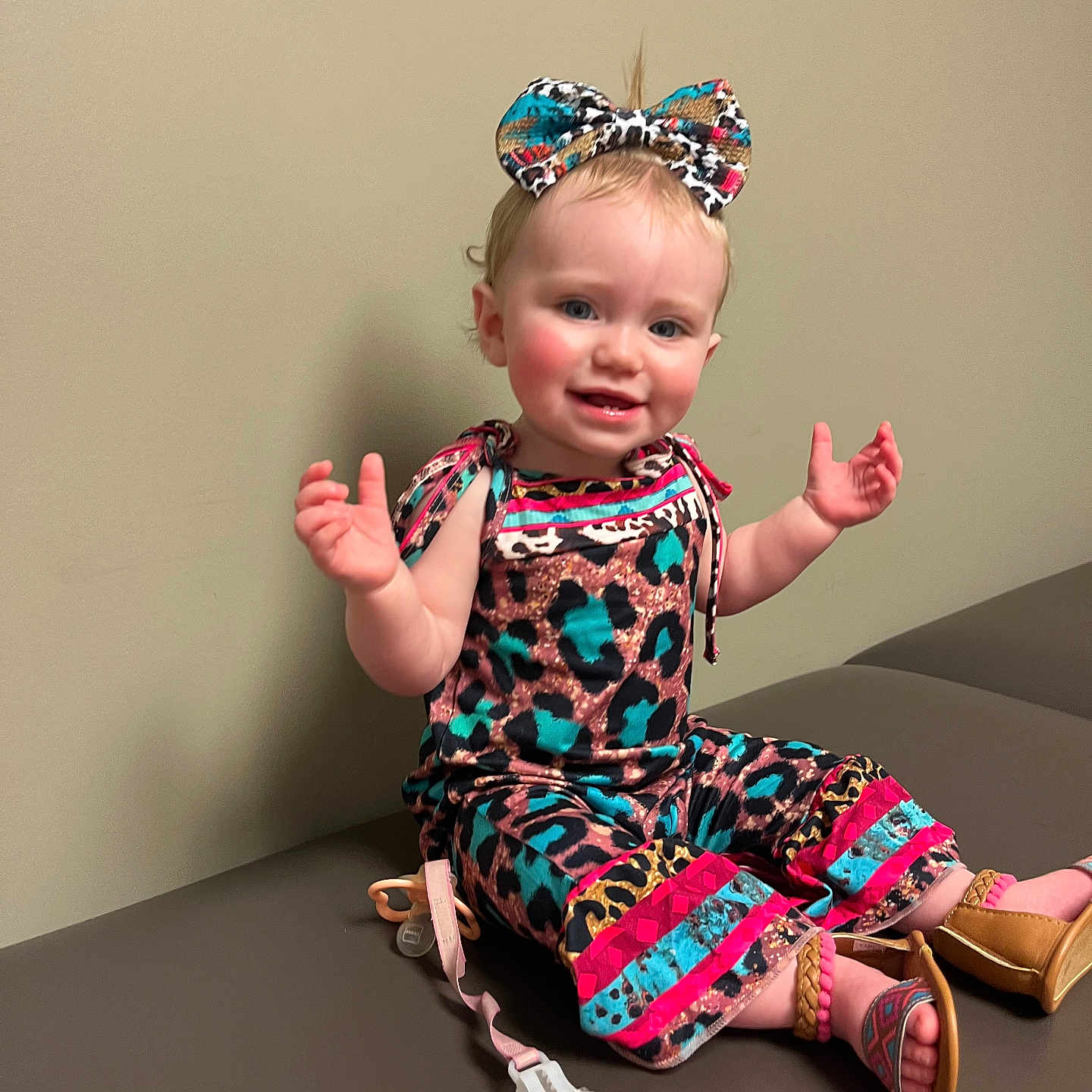 Jolena joined the competition — help win amazing prizes! accessories, baby, bodypart, clothing, dress, face, finger, footwear, hand, head, jewelry, pants, person, photography, portrait, sandal, shoe, sitting, tiara, wood