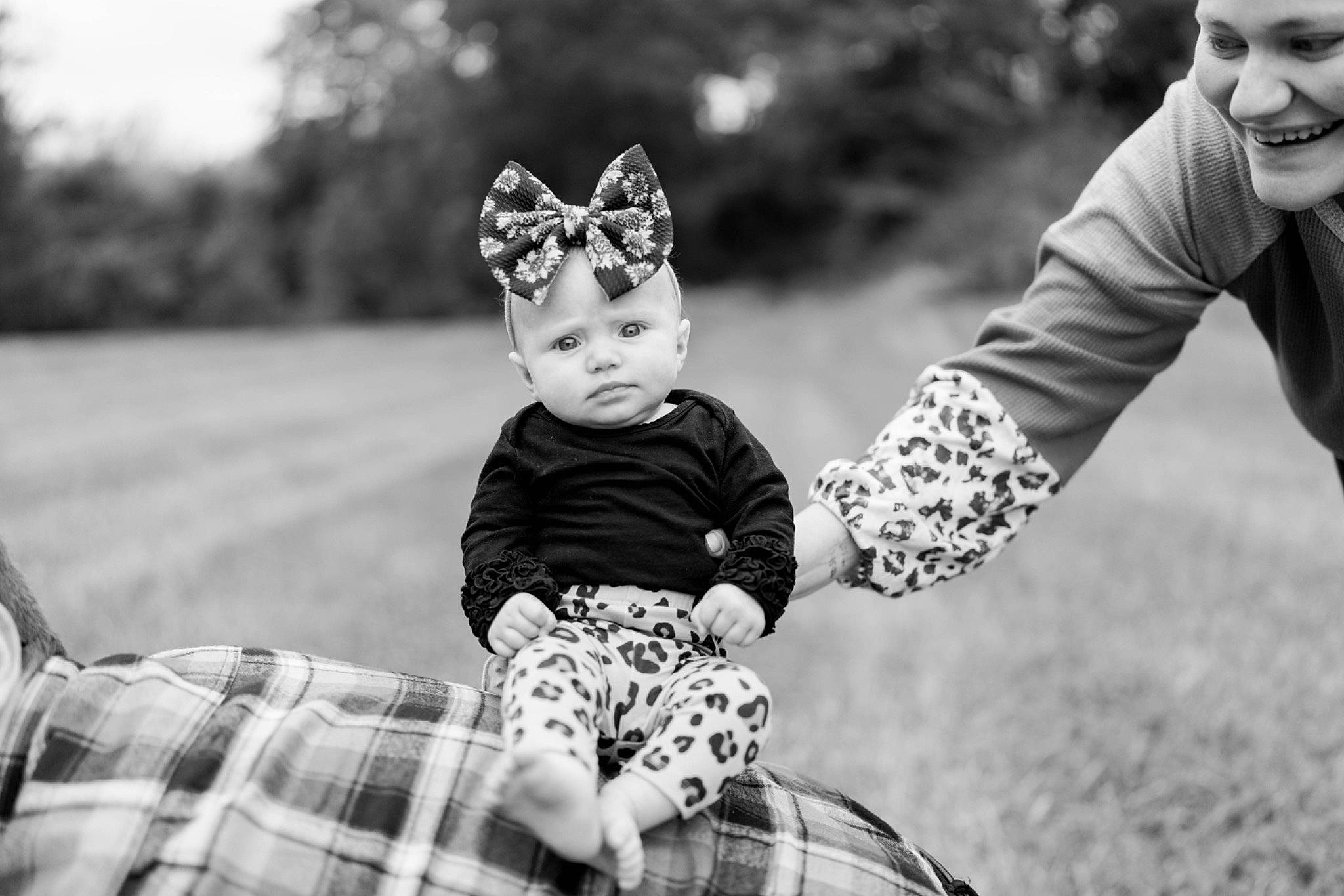 Jolena joined the competition — help win amazing prizes! black, black_and_white, eye, flash_photography, gesture, grass, hand, happy, head, headwear, joy, leaf, mammal, person, photograph, plant, smile, standing, style, tartan