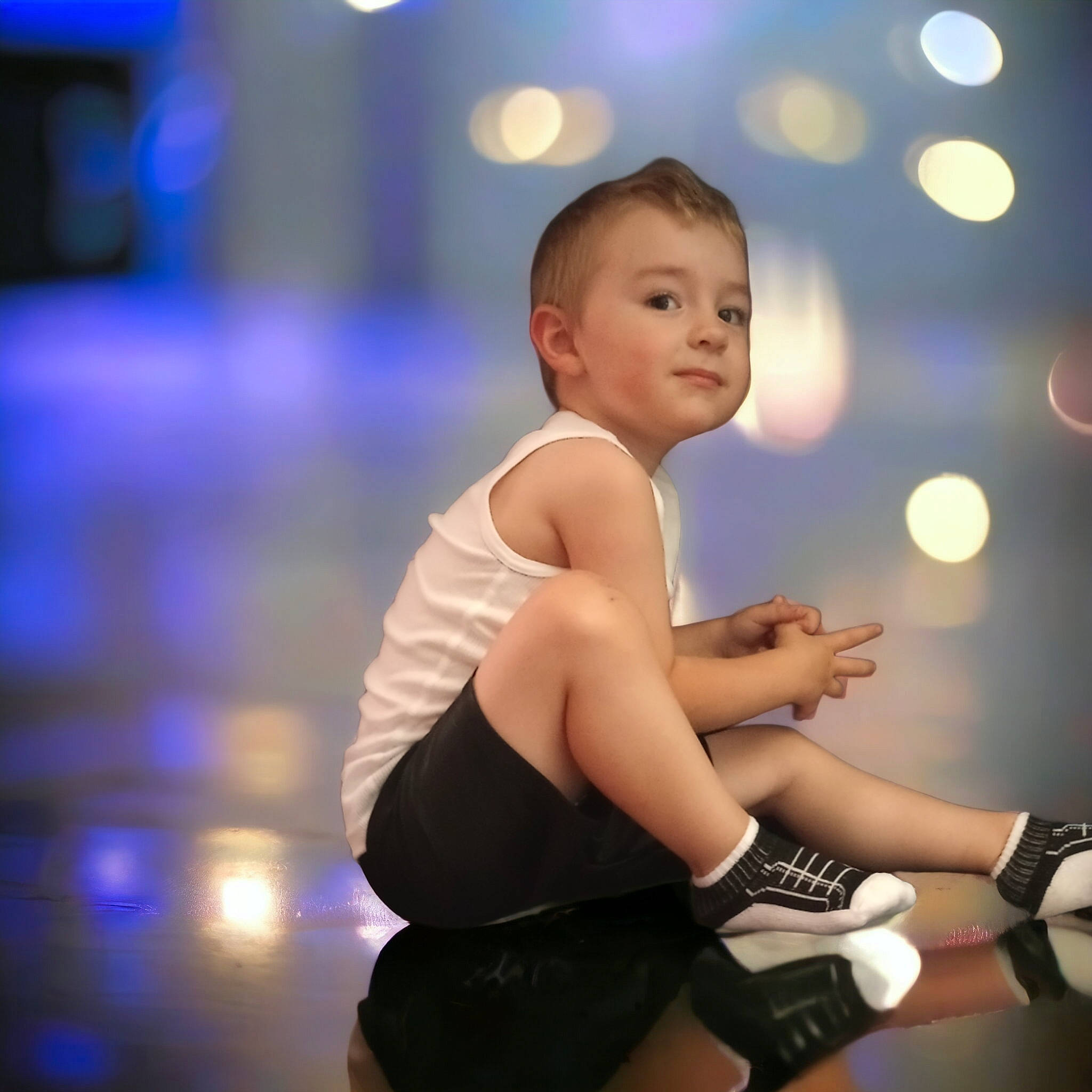 Rhykker joined the competition — help win amazing prizes! arm, elbow, electric_blue, entertainment, event, flash_photography, fun, gesture, happy, head, human_leg, knee, leg, leisure, performing_arts, person, sitting, smile, thigh, toddler