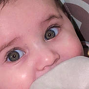Marceline joined the competition — help win amazing prizes! baby, close_up, face, eyes, blanket, hand, infant, cute, skin, soft, child, portrait, expression, young, adorable, person, cozy, comfort, toddler, indoor