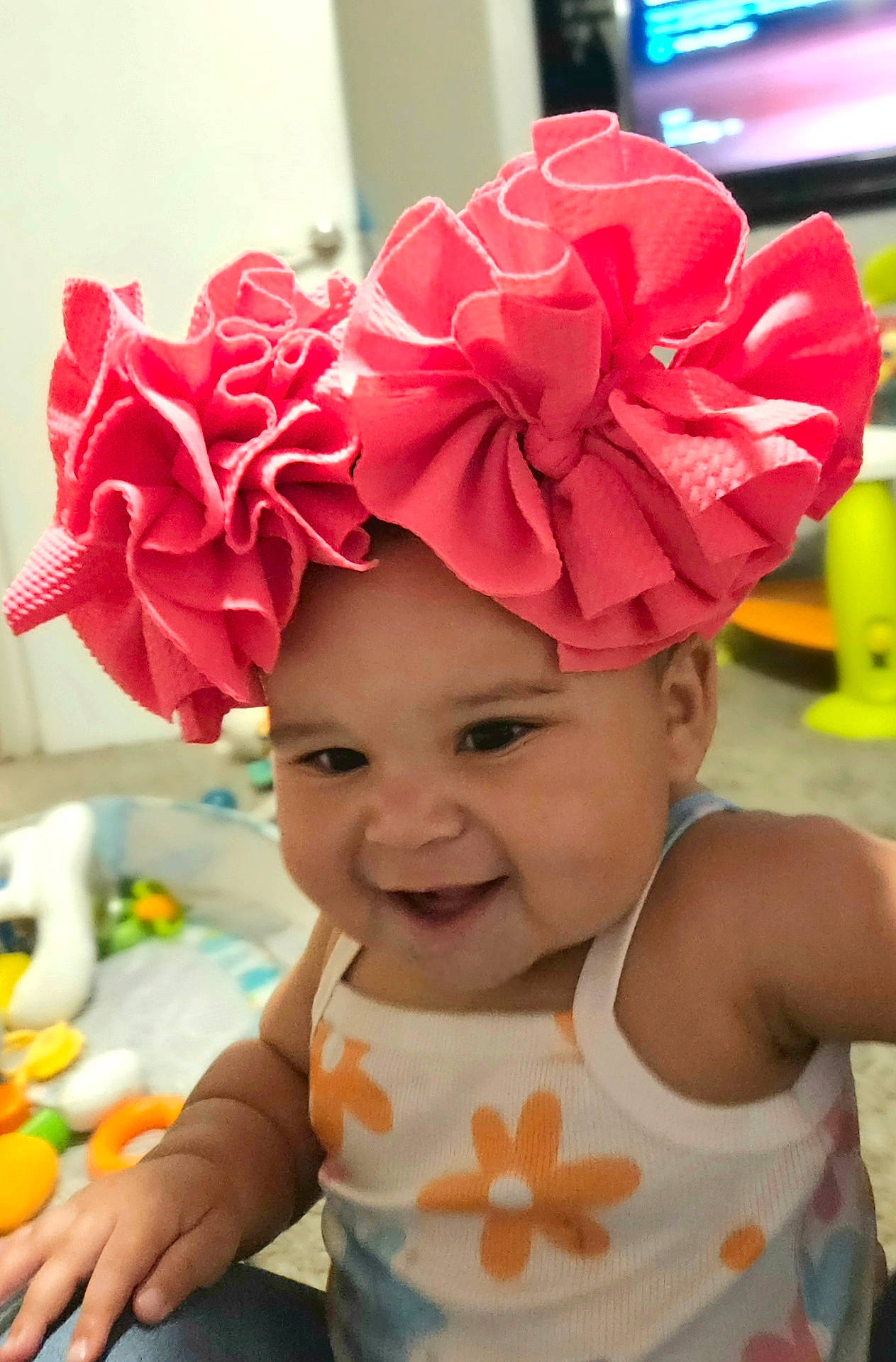 Nyla is registered to the contest to win money with this photo: accessories, baby, cap, clothing, computerhardware, costume, dress, electronics, face, flower, happy, hat, head, person, petal, photography, plant, portrait, rose, swimwear