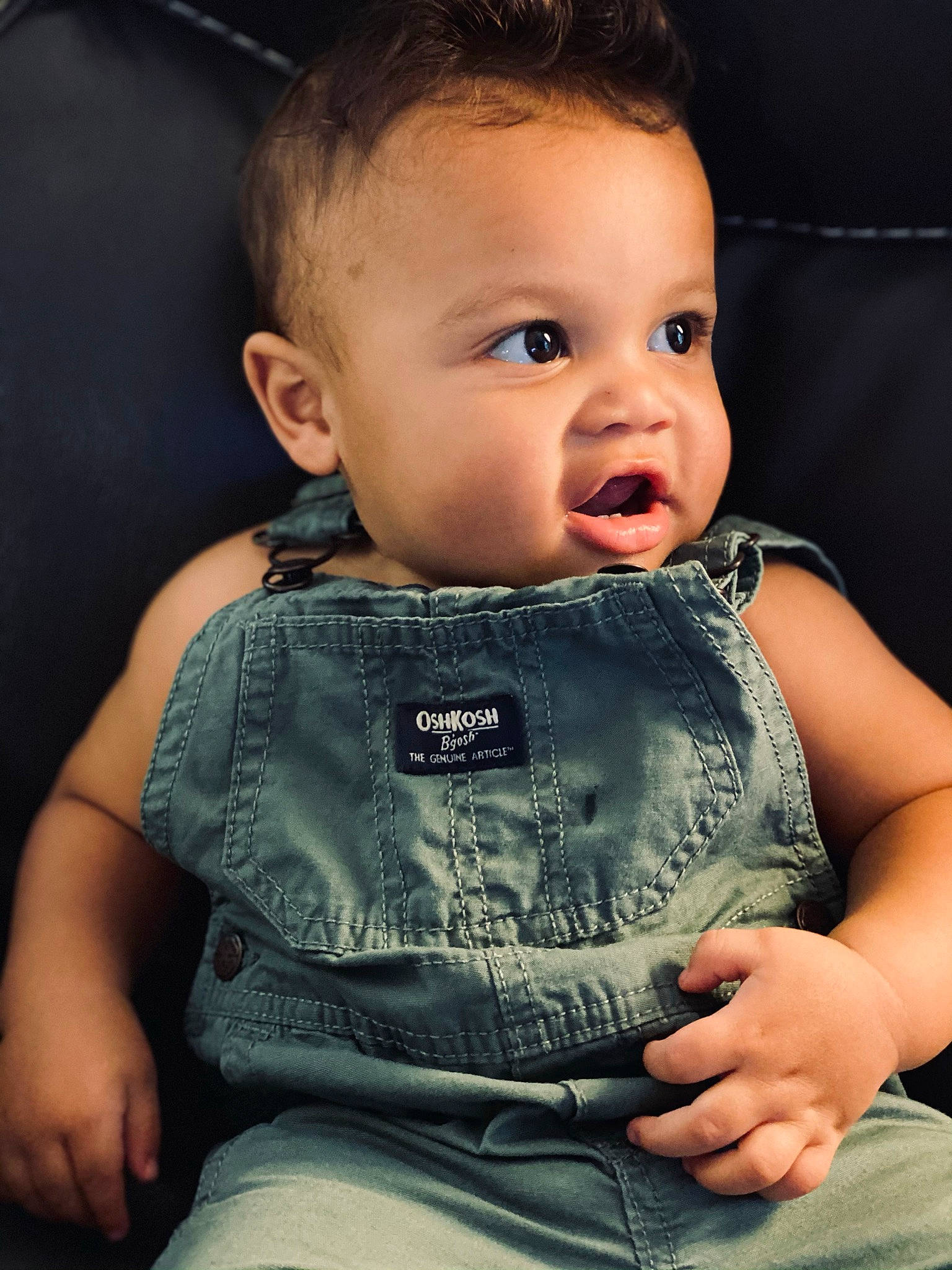 Justin is registered to the contest to win money with this photo: active_tank, baby, baby_products, baby_toddler_clothing, cheek, child, comfort, ear, eyelash, finger, hand, iris, person, portrait_photography, shoulder, sitting, skin, toddler, trunk