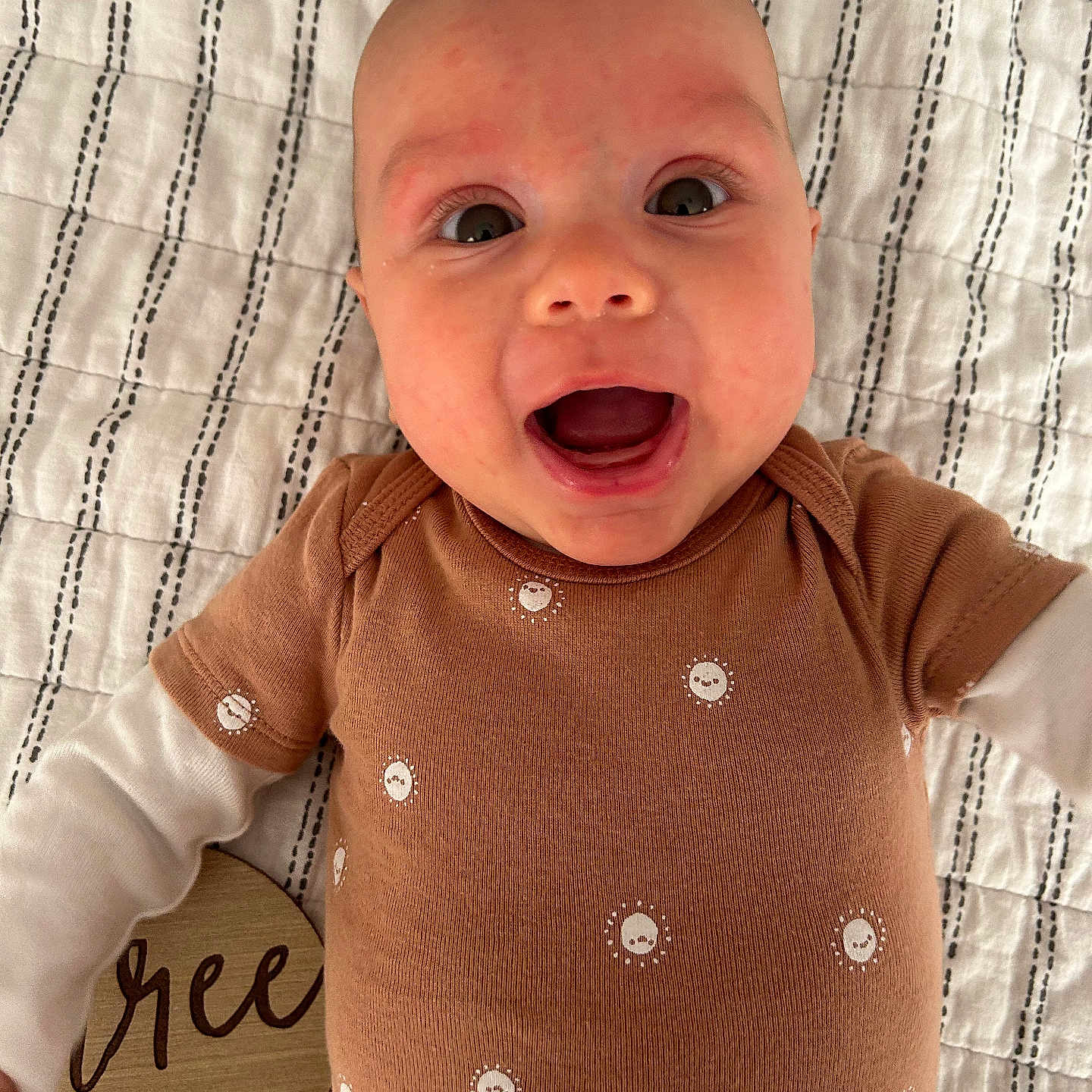 Rainn joined the competition — help win amazing prizes! baby, babylaughing, clothing, face, happy, head, knitwear, laughing, newborn, pattern, person, photography, portrait, shirt, sweater, t_shirt, yawning