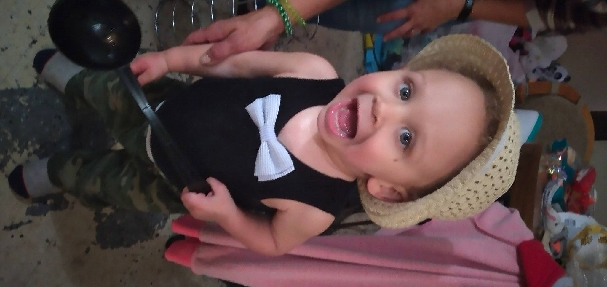 Keith is registered to the contest to win money with this photo: arm, baby, baby_toddler_clothing, chair, cheek, eyelash, face, facial_expression, finger, fun, gesture, hand, happy, lip, mouth, nose, person, skin, smile, surprise