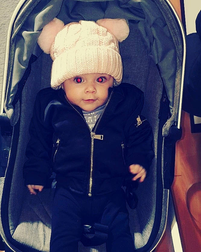 Mia-rose joined the competition — help win amazing prizes! baby, baby_carriage, baby_products, blond, blue, cheek, child, cool, eye, face, head, headgear, headwear, jacket, outerwear, person, product, skin, snow, textile