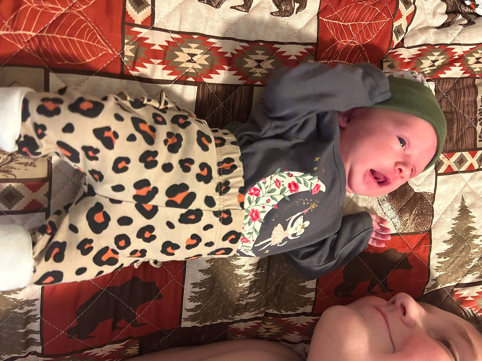Nicole joined the competition — help win amazing prizes! baby, baby_products, baby_toddler_clothing, carmine, child, comfort, fashion_accessory, human_leg, joy, lap, linens, mammal, pattern, person, red, room, sitting, sleeve, smile, textile