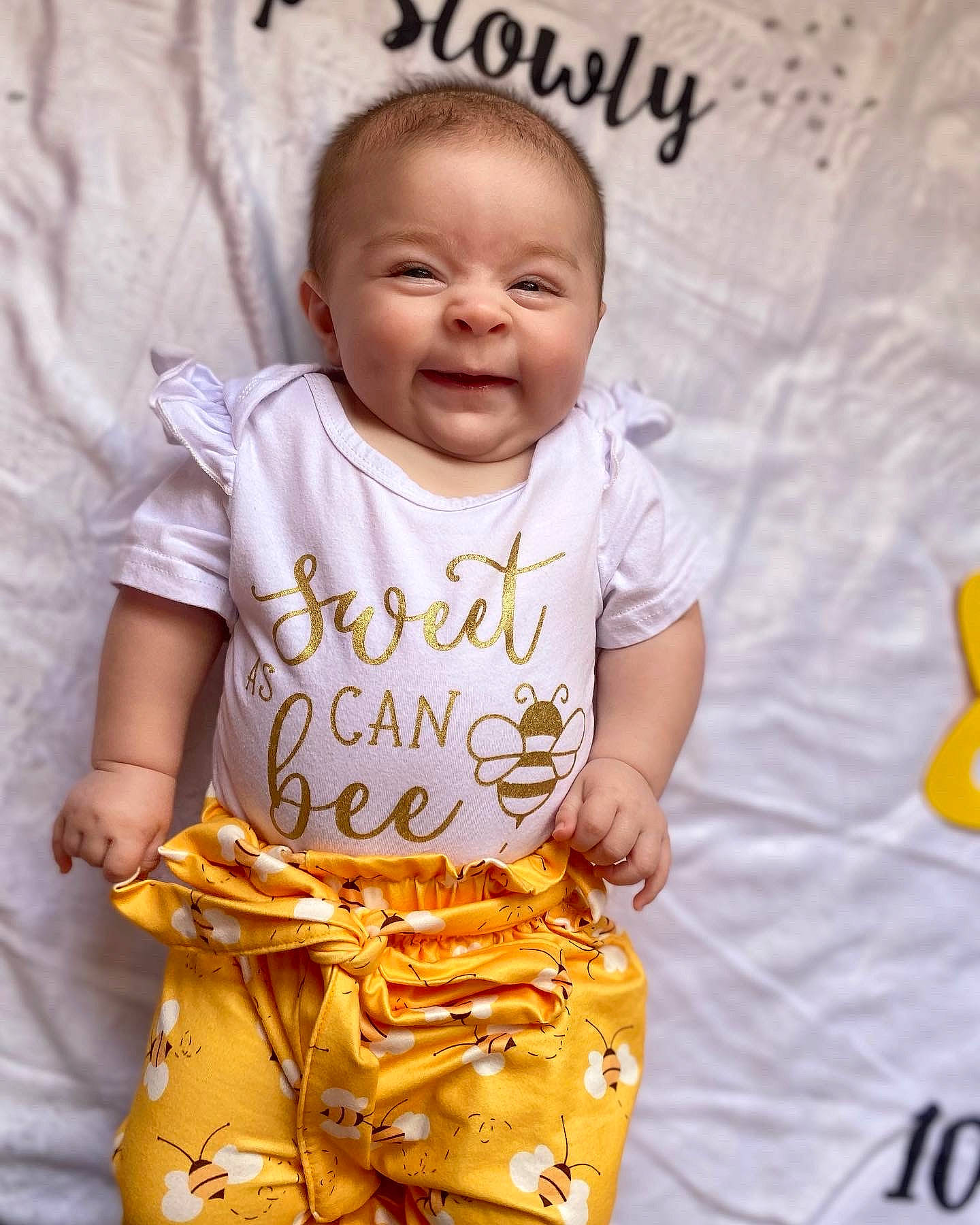 Brayleigh is registered to the contest to win money with this photo: baby, baby_toddler_clothing, bag, child, face, fun, happy, luggage_and_bags, orange, people, people_in_nature, person, photograph, product, sleeve, smile, street_fashion, t_shirt, textile, toddler