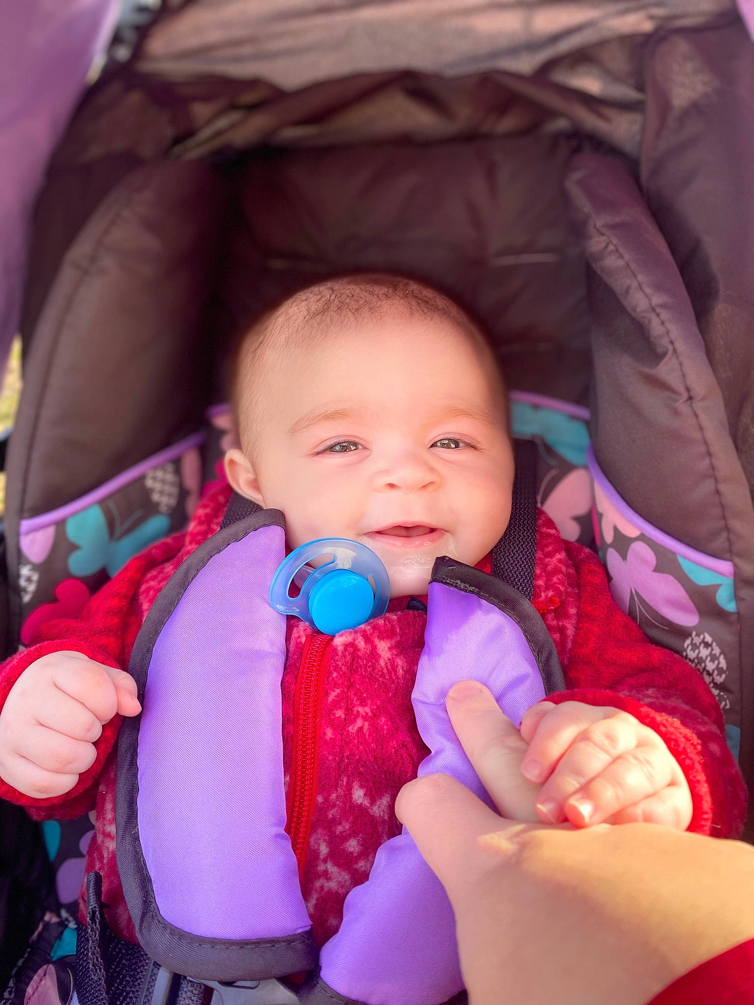 Brayleigh is registered to the contest to win money with this photo: arm, baby, baby_carriage, baby_toddler_clothing, cheek, chin, comfort, eye, eyebrow, gesture, hand, head, iris, lip, mouth, person, product, purple, skin, smile