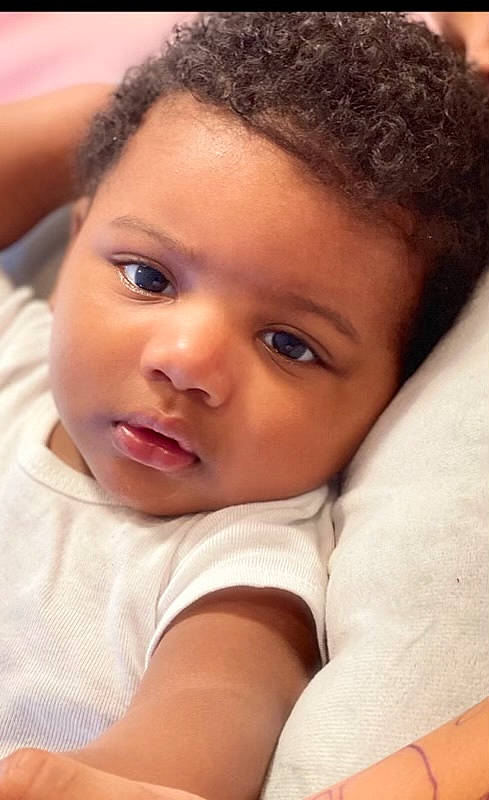 Chayse is registered to the contest to win money with this photo: baby, black_hair, cheek, child, chin, close_up, comfort, eyebrow, eyelash, flash_photography, forehead, happy, iris, lip, mouth, no_expression, nose, person, skin, smile