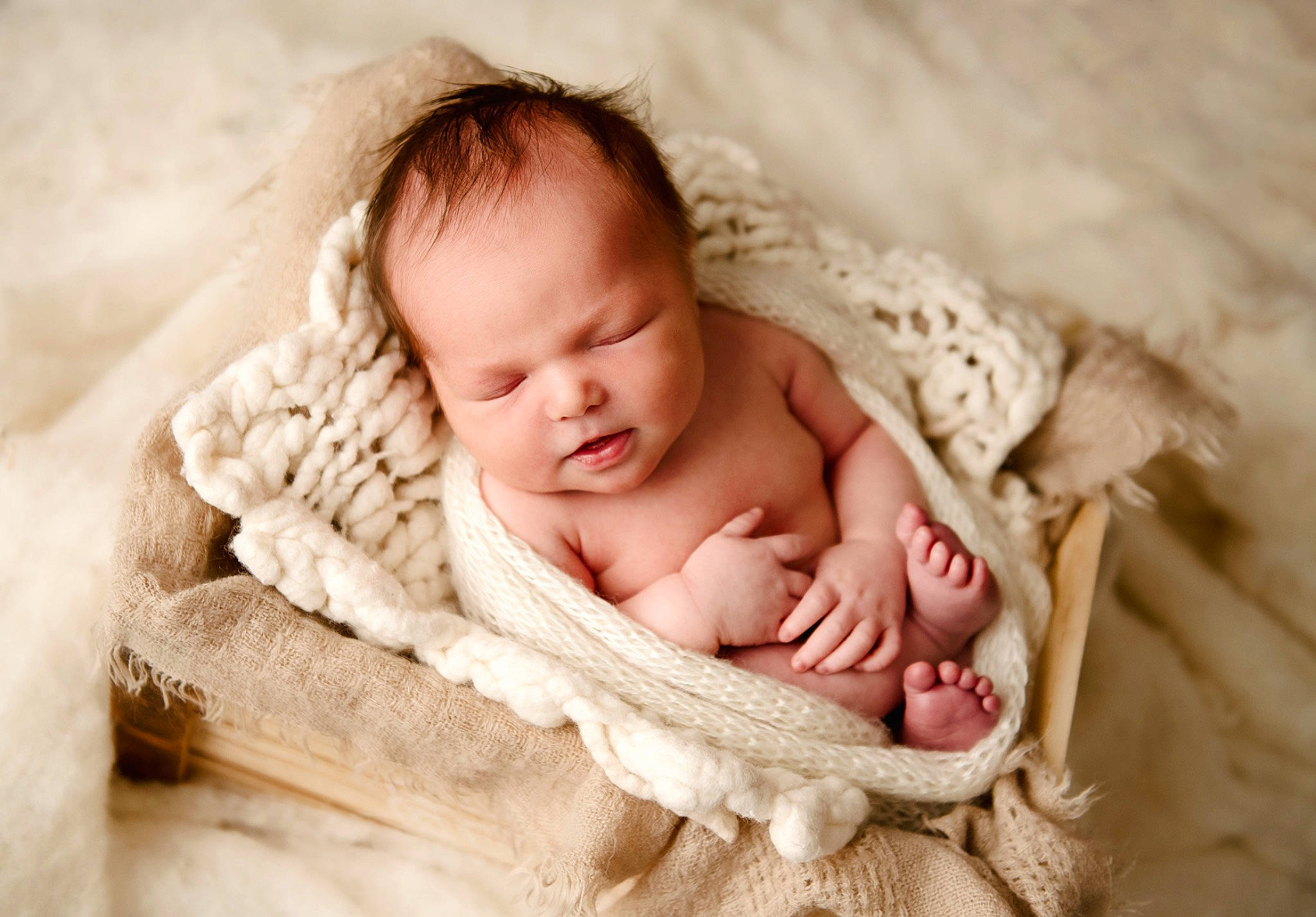 Killian is registered to the contest to win money with this photo: baby, baby_sleeping, baby_toddler_clothing, bedding, bedtime, cheek, child, comfort, face, fashion_accessory, flash_photography, fur, happy, linens, person, sitting, skin, textile, toddler, wood