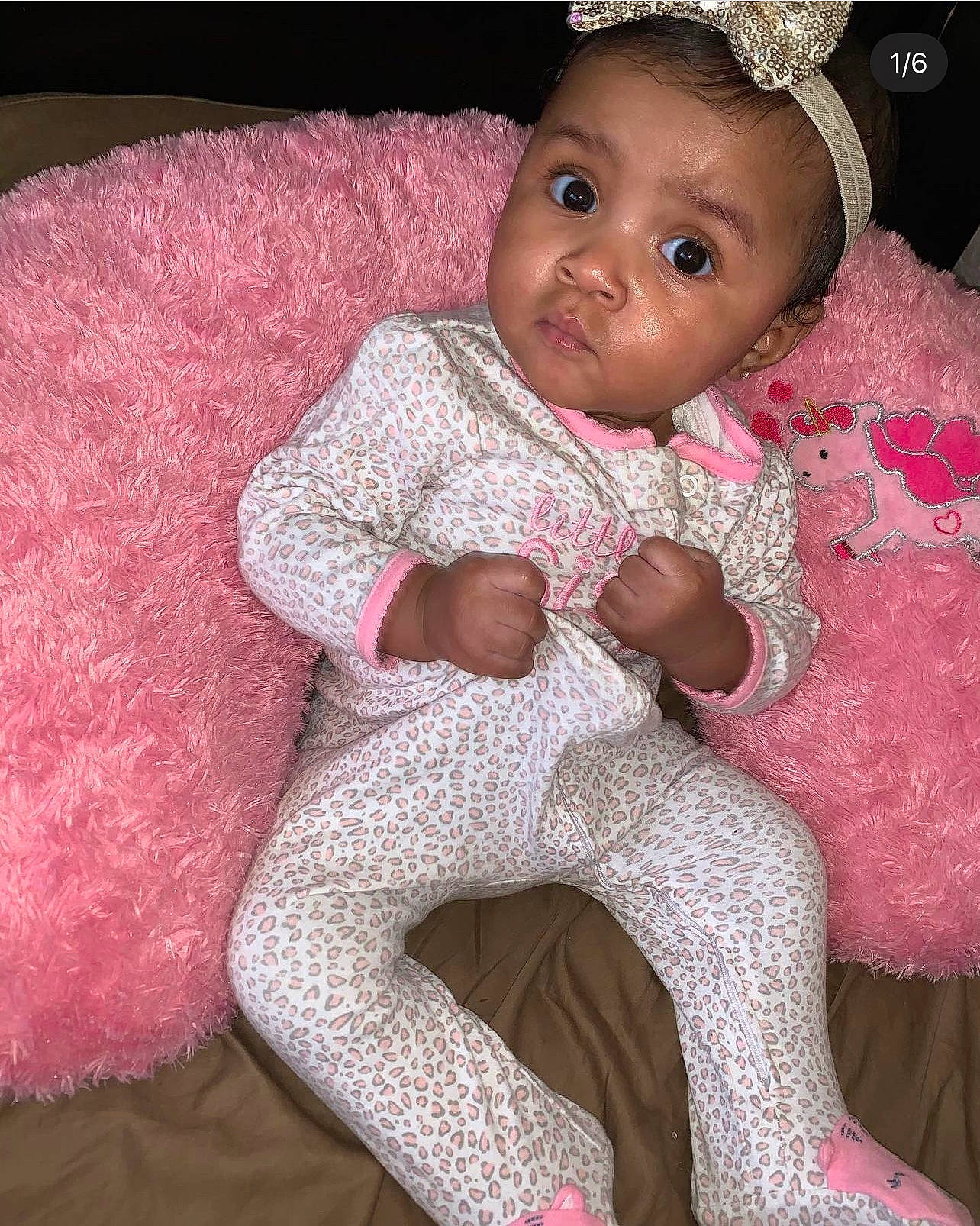 Jalayah is registered to the contest to win money with this photo: arm, baby, baby_toddler_clothing, cheek, chin, dress, eye, face, facial_expression, hair, hairstyle, happy, head, human_body, iris, lip, person, pink, skin, sleeve