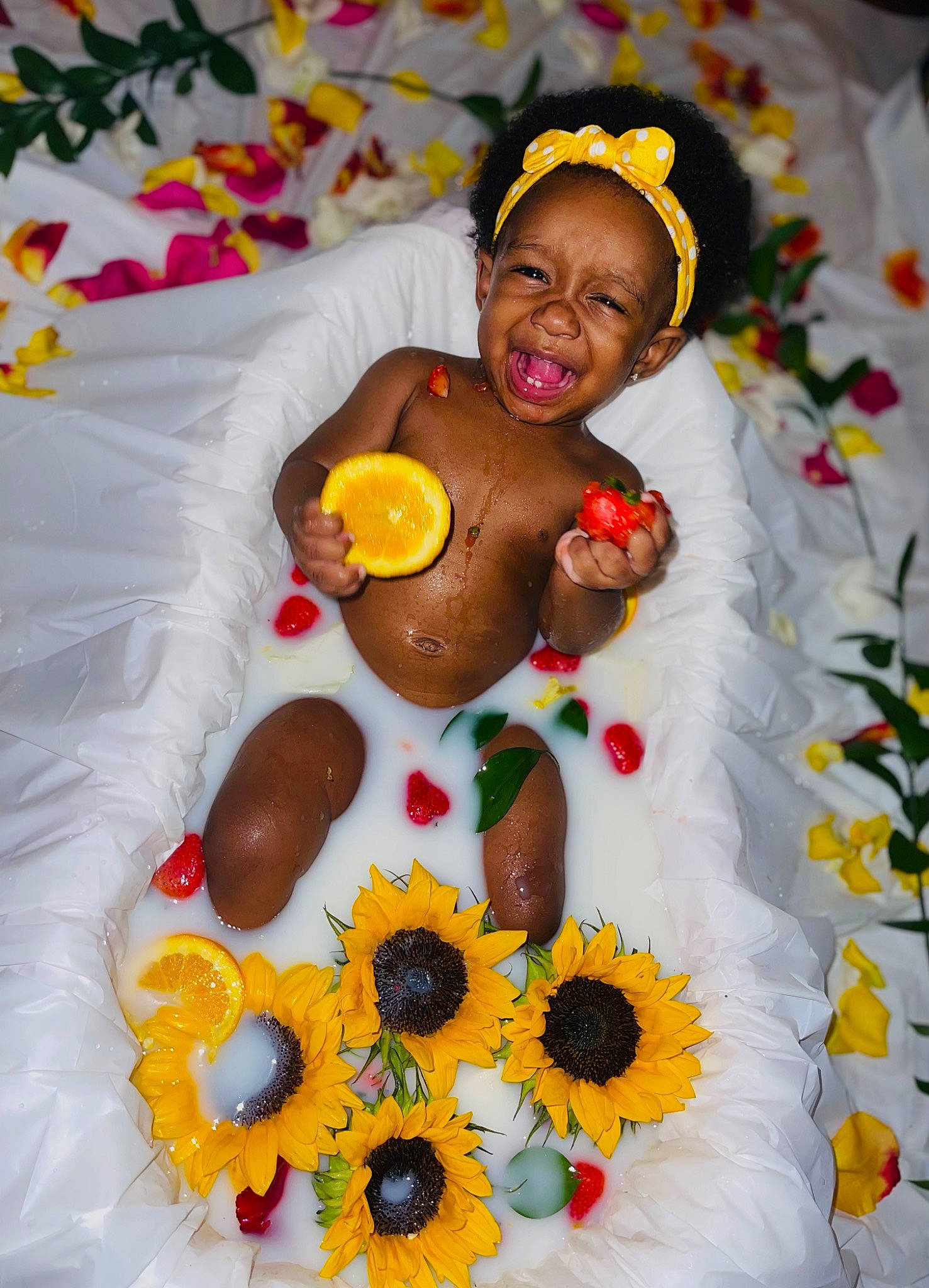 Arabella joined the competition — help win amazing prizes! annual_plant, artificial_flower, baby_toddler_clothing, bouquet, cut_flowers, event, floral_design, floristry, flower, flower_arranging, happy, hat, jewellery, lei, orange, person, petal, smile, toddler, tradition