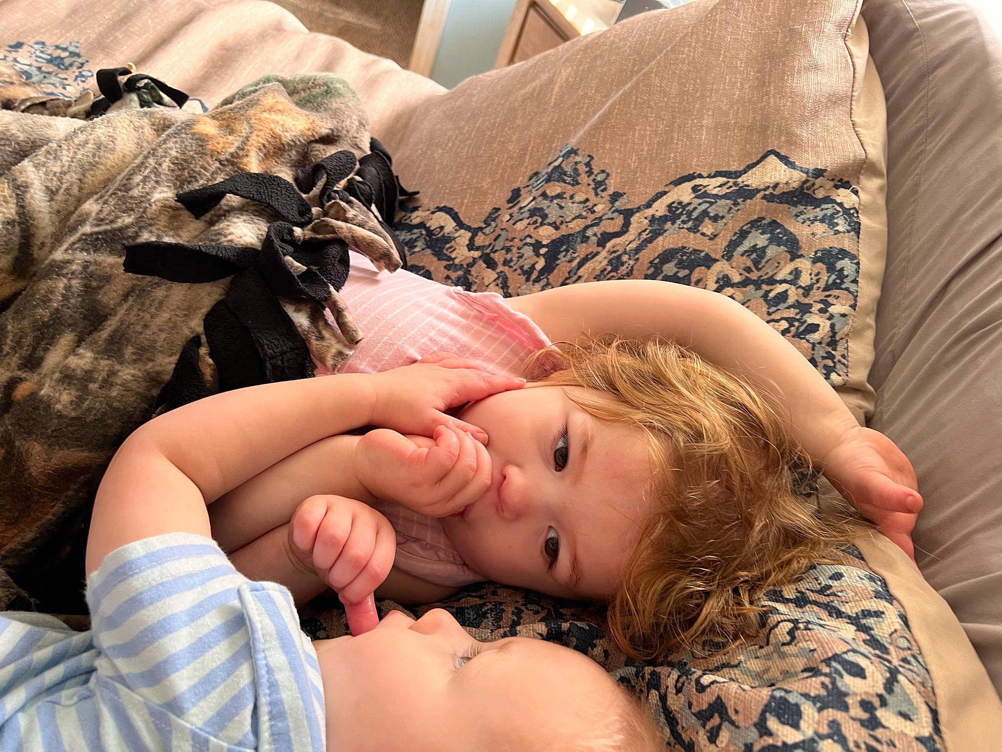 Merrissa is registered to the contest to win money with this photo: arm, comfort, eyelash, finger, gesture, grass, hair, hairstyle, hand, happy, head, human_leg, joint, lip, long_hair, mammal, neck, person, shoulder, skin