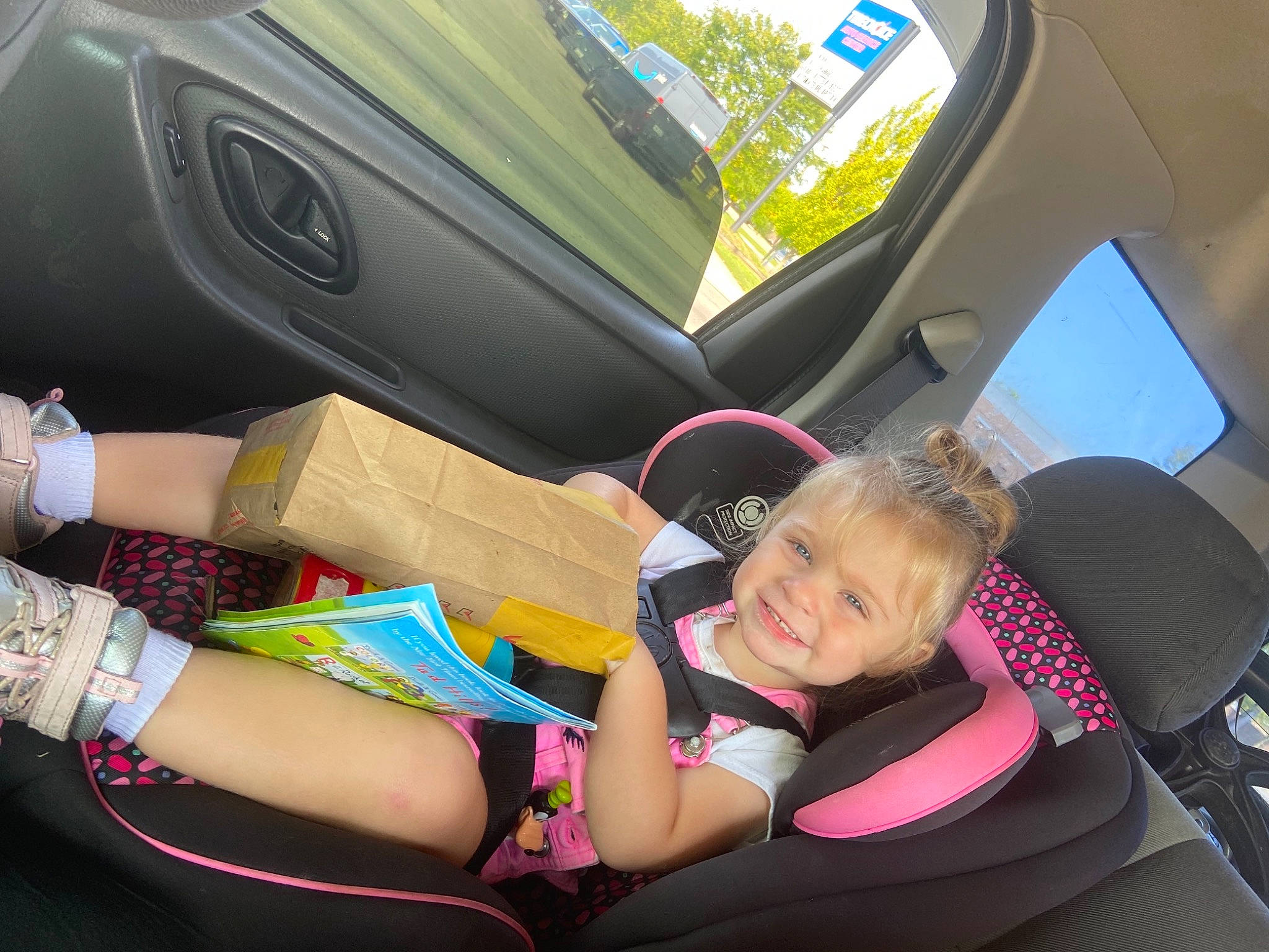 Lillian Daley joined the competition — help win amazing prizes! auto_part, automotive_design, automotive_exterior, automotive_wheel_system, car, car_seat, comfort, finger, human_leg, joy, knee, lap, leg, leisure, motor_vehicle, person, shorts, smile, steering_wheel, thigh