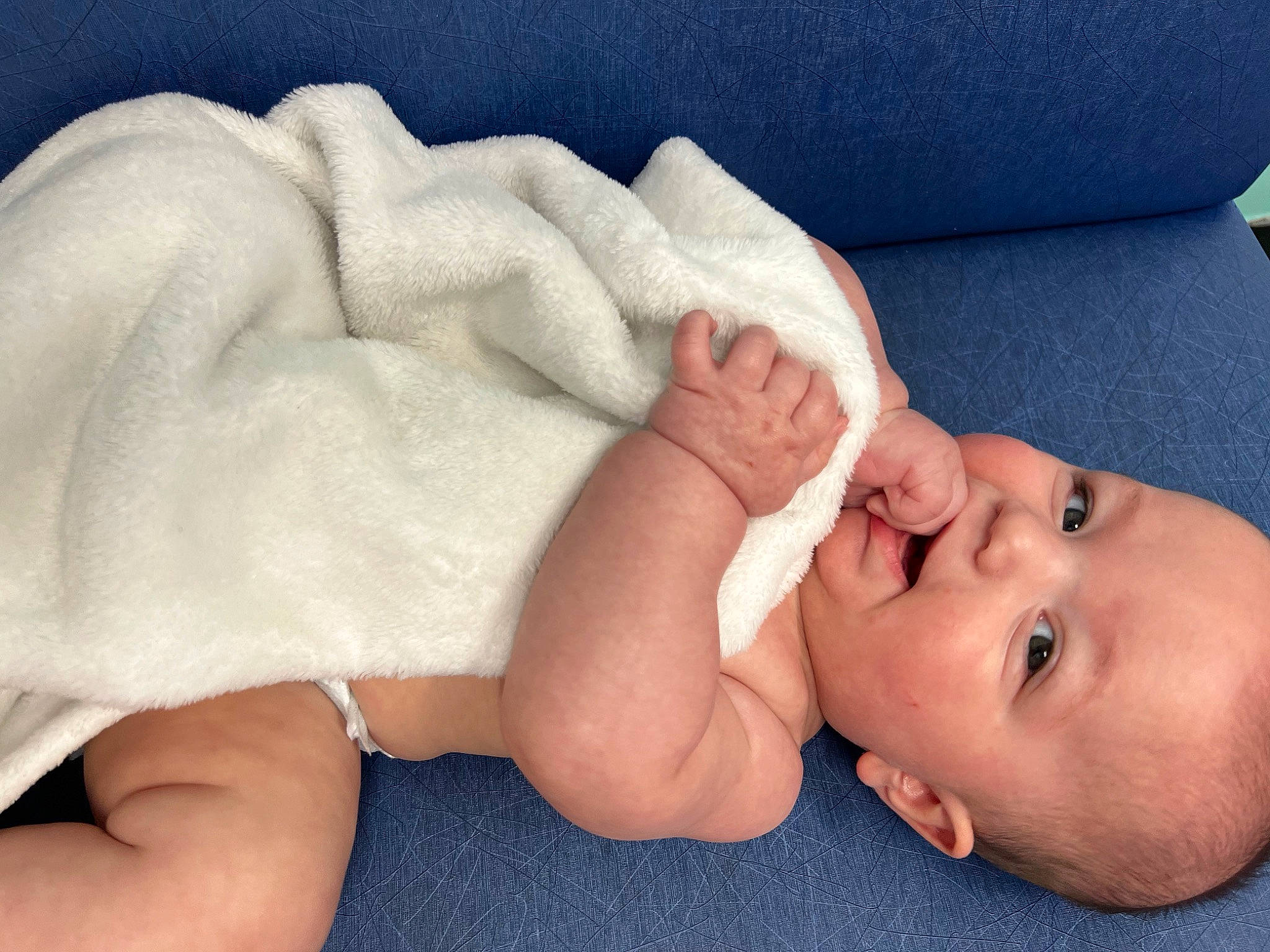 Arthur joined the competition — help win amazing prizes! baby, baby_sleeping, baby_toddler_clothing, bed, cheek, child, comfort, finger, foot, gesture, human_leg, linens, mouth, nail, person, skin, thumb, toddler, toe, white