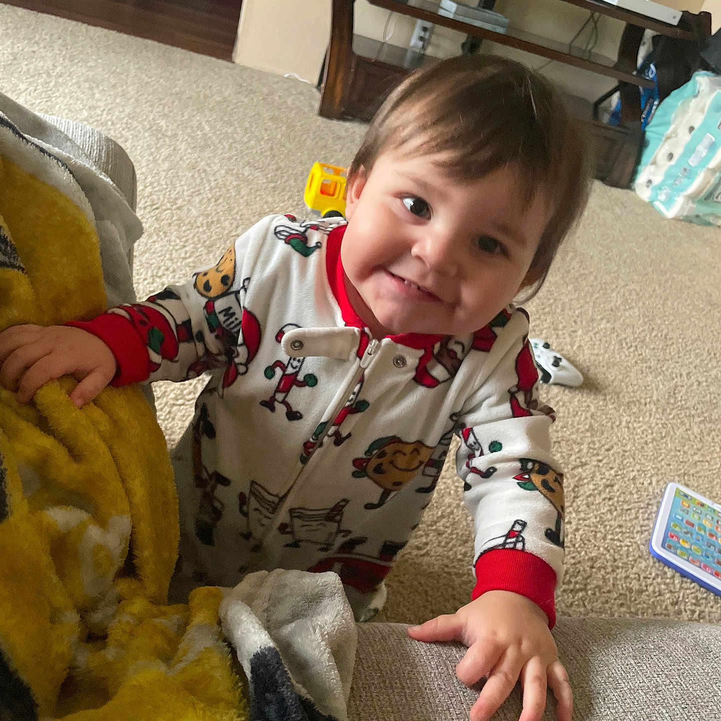 Makoa is registered to the contest to win money with this photo: architecture, baby, bodypart, clothing, coat, couch, face, finger, furniture, hand, happy, head, homedecor, indoors, interiordesign, person, photography, portrait, sitting, smile
