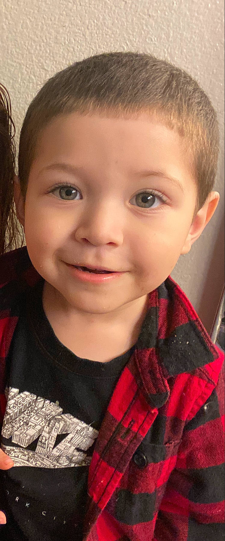 Dante is registered to the contest to win money with this photo: black_hair, cheek, chin, collar, cool, eyebrow, eyelash, flash_photography, forehead, happy, iris, jaw, joy, lip, neck, nose, person, plaid, skin, smile